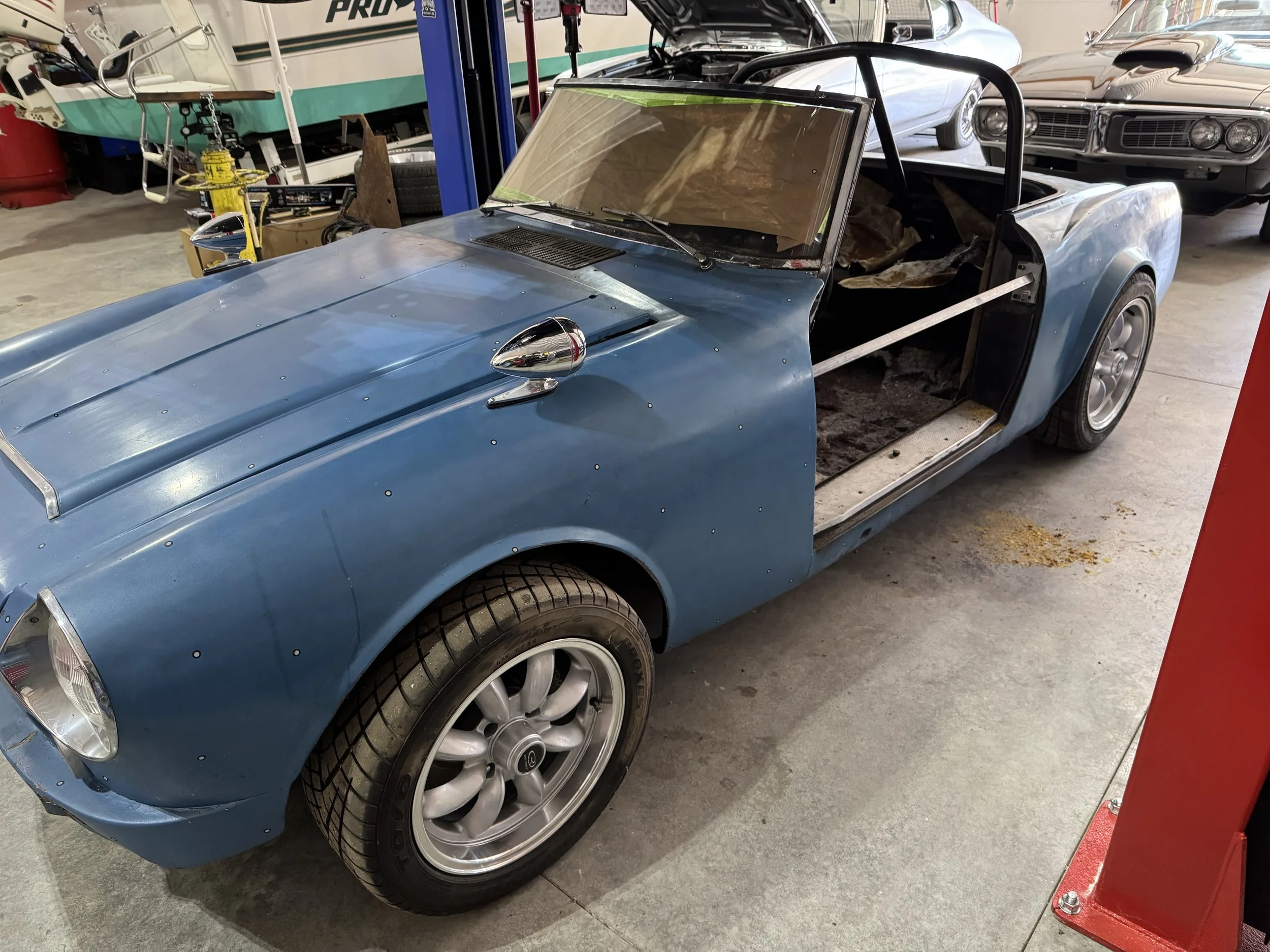 Temporary body bracing installed before chassis separation.