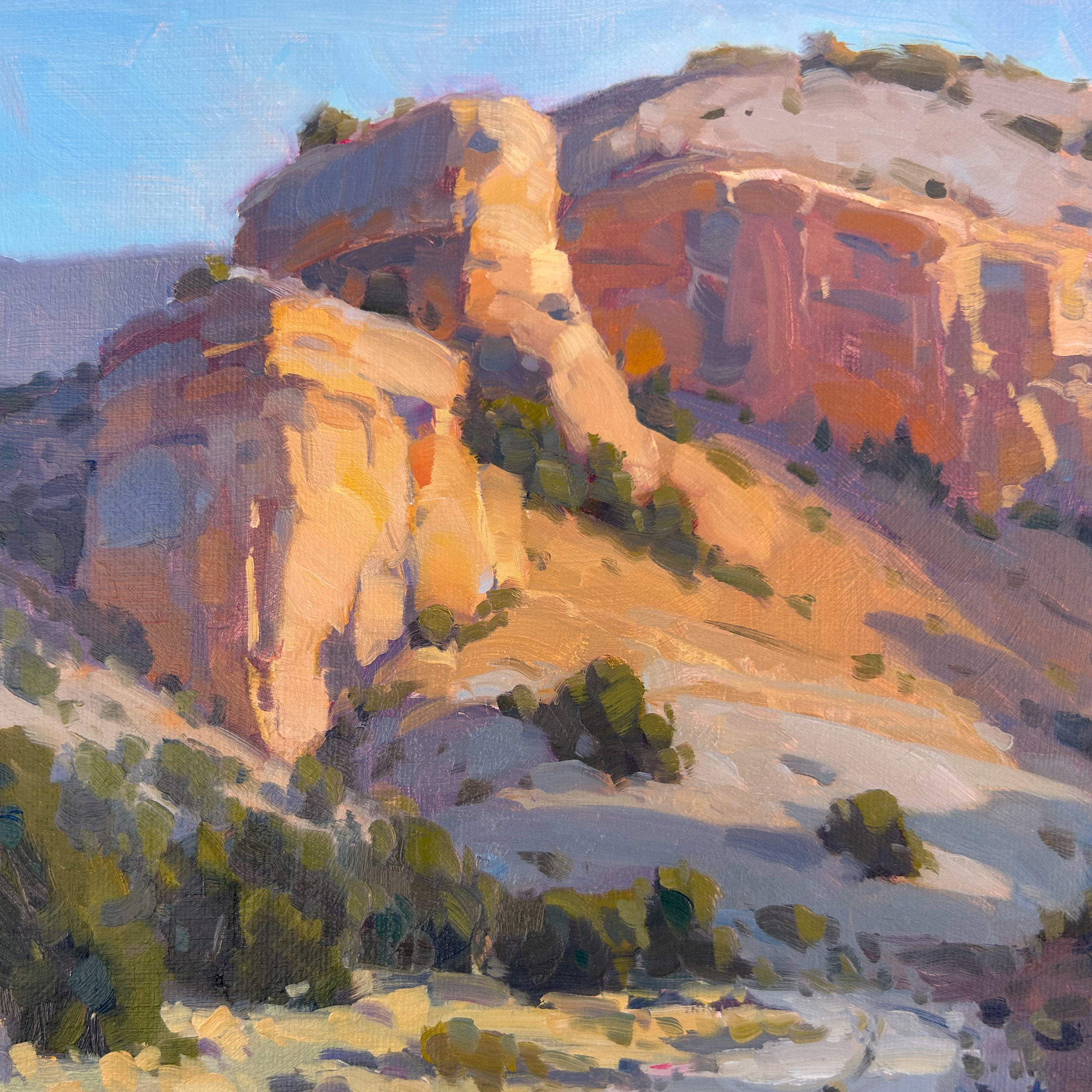 An impressionistic painting of colorful bluffs, pinyon pines, and a blue sky near Dinosaur National Monument in Utah.