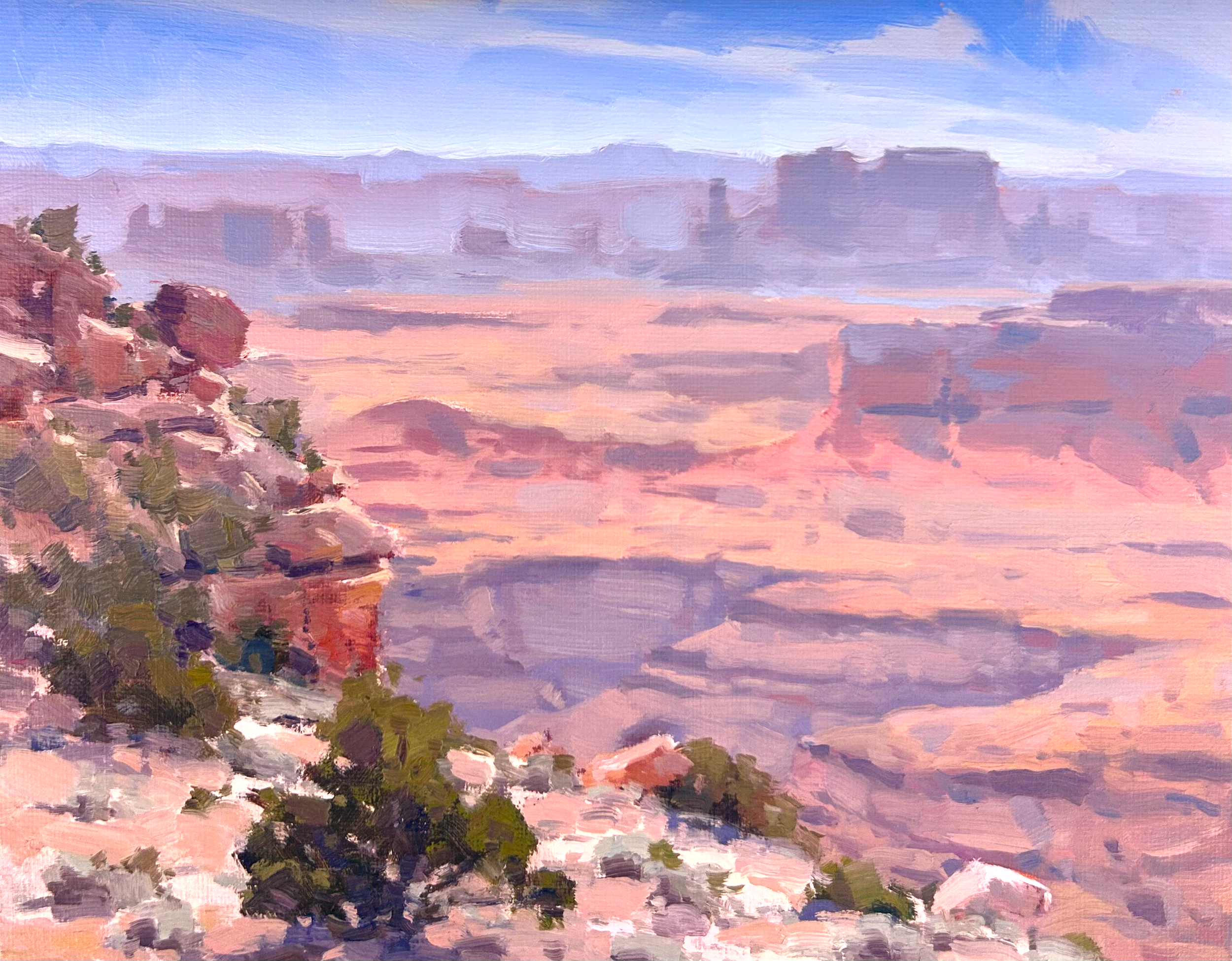 A digital painting of a city skyline at sunset with pastel pink, purple, and blue sky and clouds, viewed from a rocky hillside with green trees in the foreground.