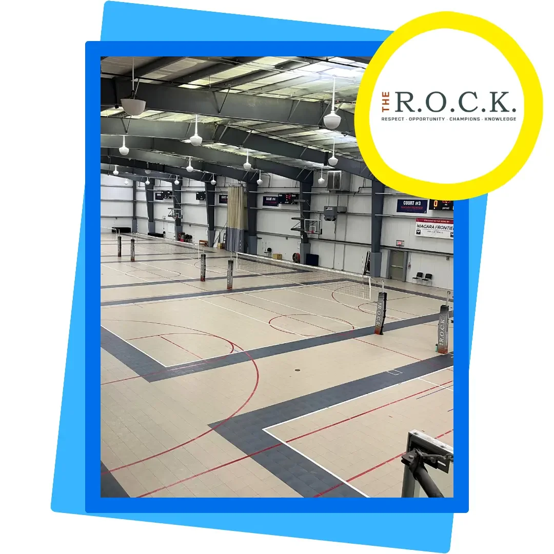 Wide view of The R.O.C.K. indoor sports facility in West Seneca New York, featuring multiple volleyball and basketball courts, showcasing a premier training venue for youth development and athletic programs.