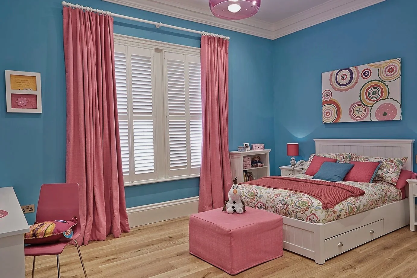 Child's bedroom with pink and blue decoration. Contemporary interior design.