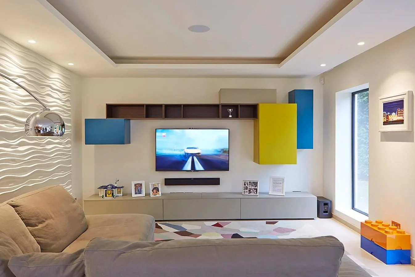 Contemporary sitting room in art deco home, interior design, bold colour accents.