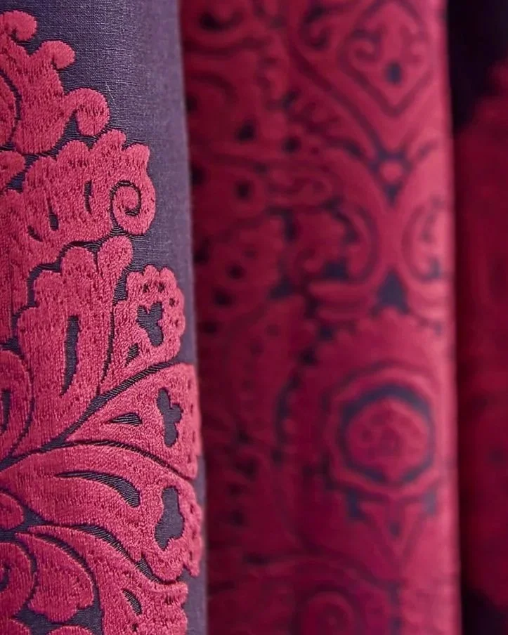 Close up of purple and red velvet fabric 
