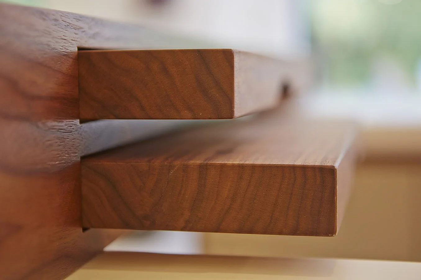 Close up adjustable wooden shelf.