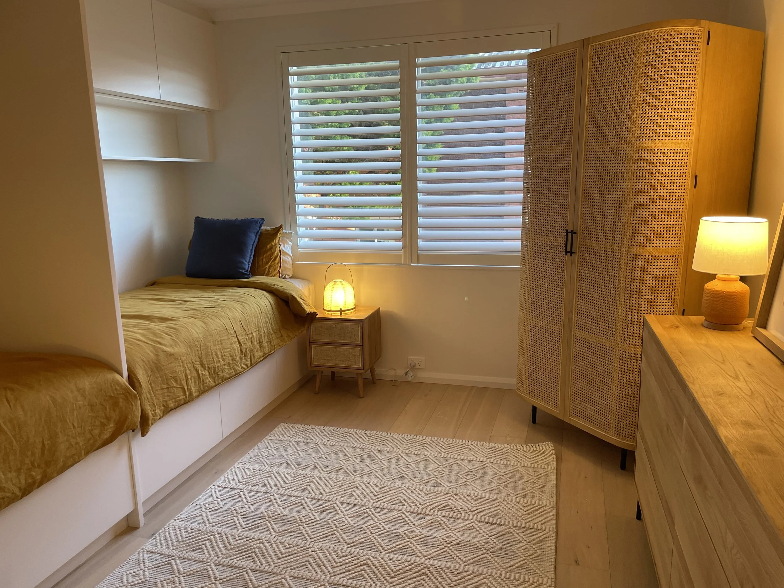 bedroom with warm yellows and beiges, natural and neutral vibes