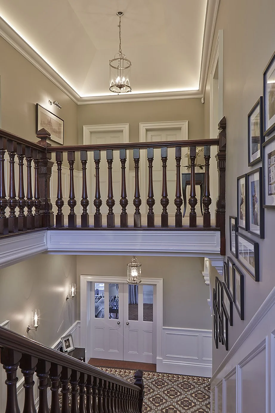 View of staircase landing area in Victoria Style home