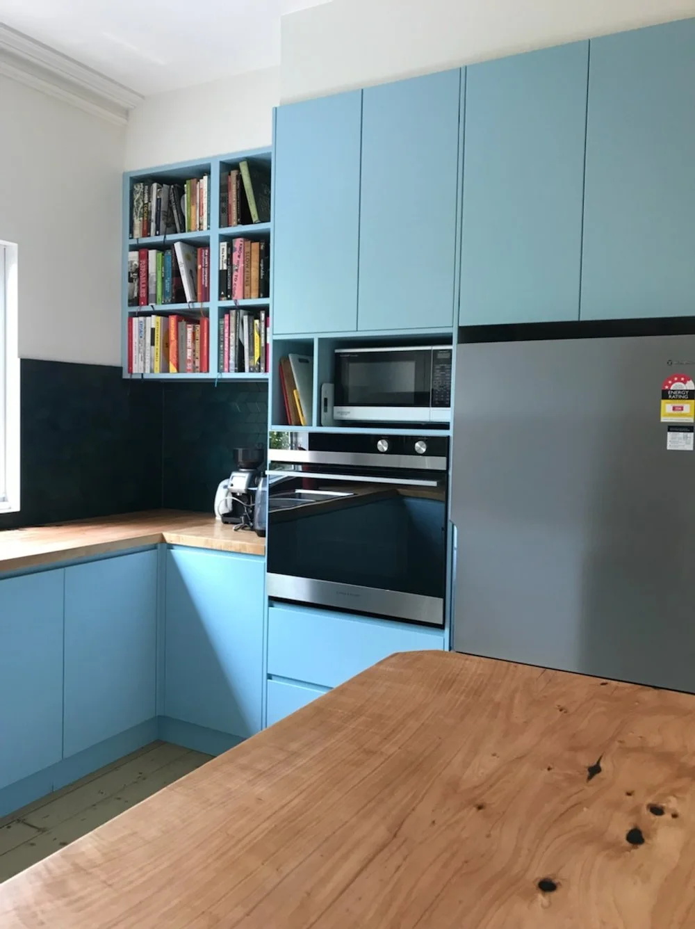 View of the kitchen appliances in this kitchen renovation, where we struck a balance between practicality and contemporary interior design.