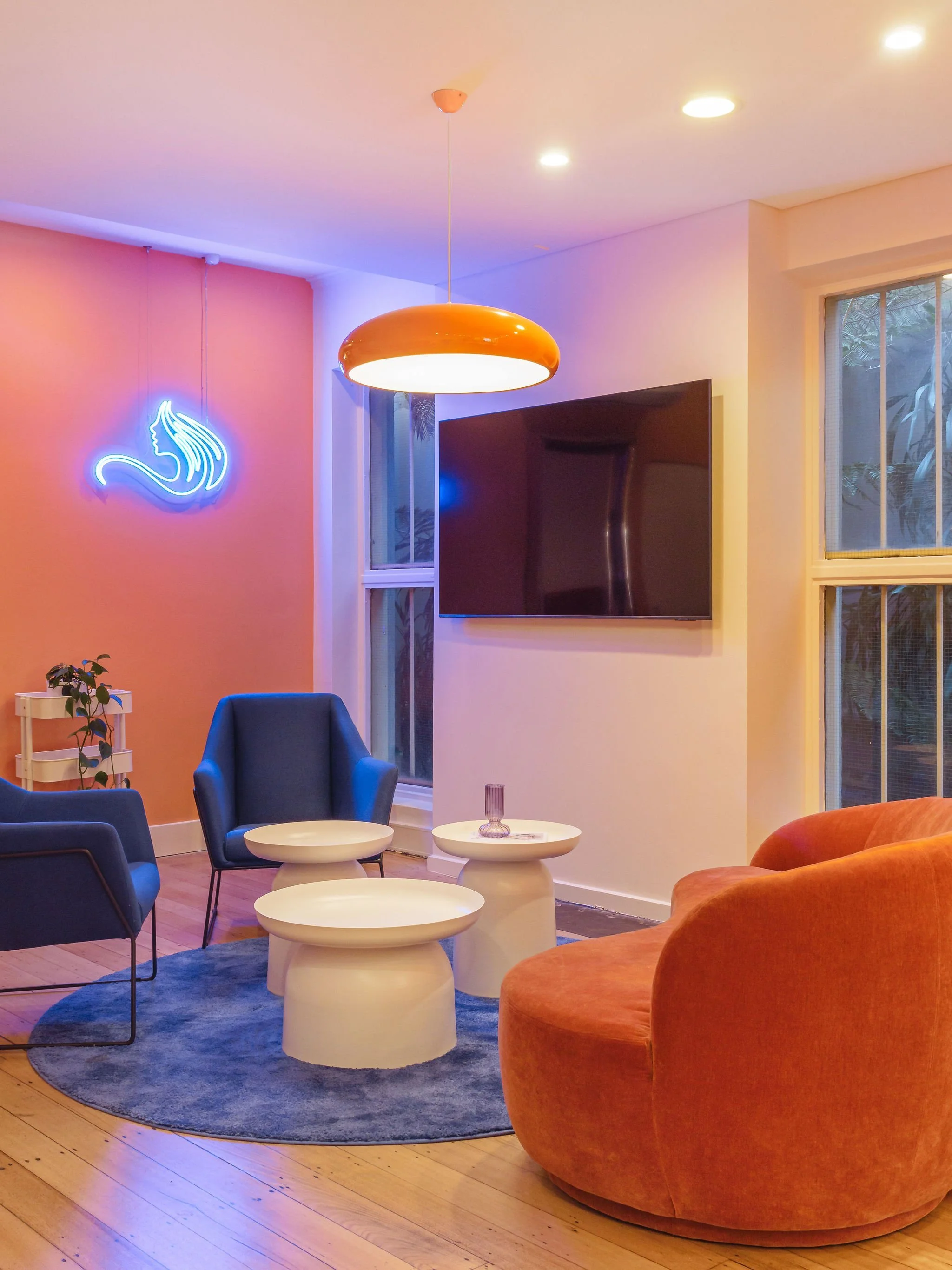 View of the sitting area in the agency, an inviting collaborative space which makes use of fun colours.