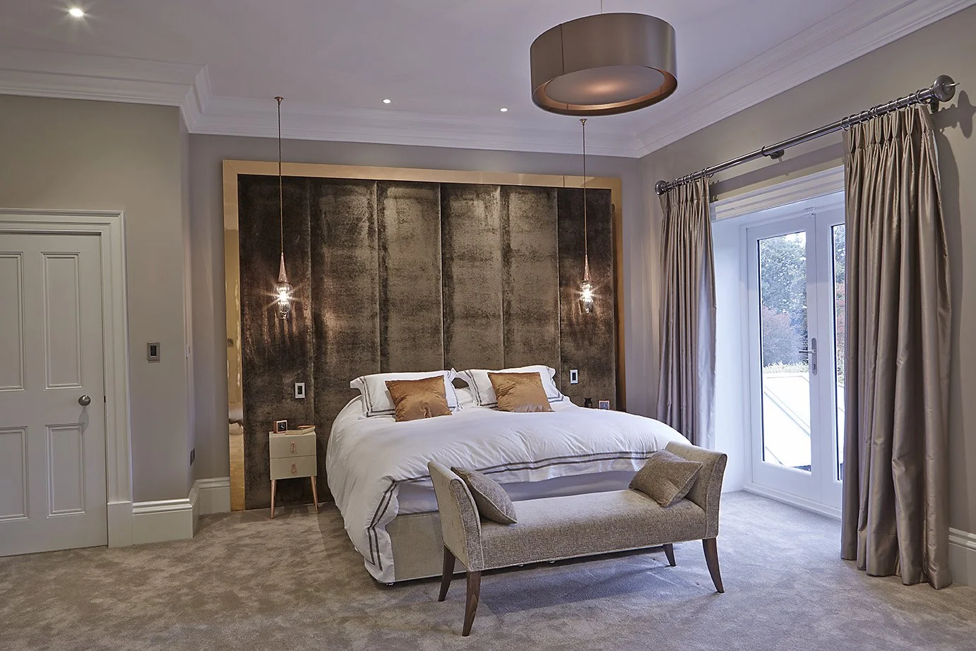 Master bedroom in contemporary, Victoria style home, brown and velvet details 