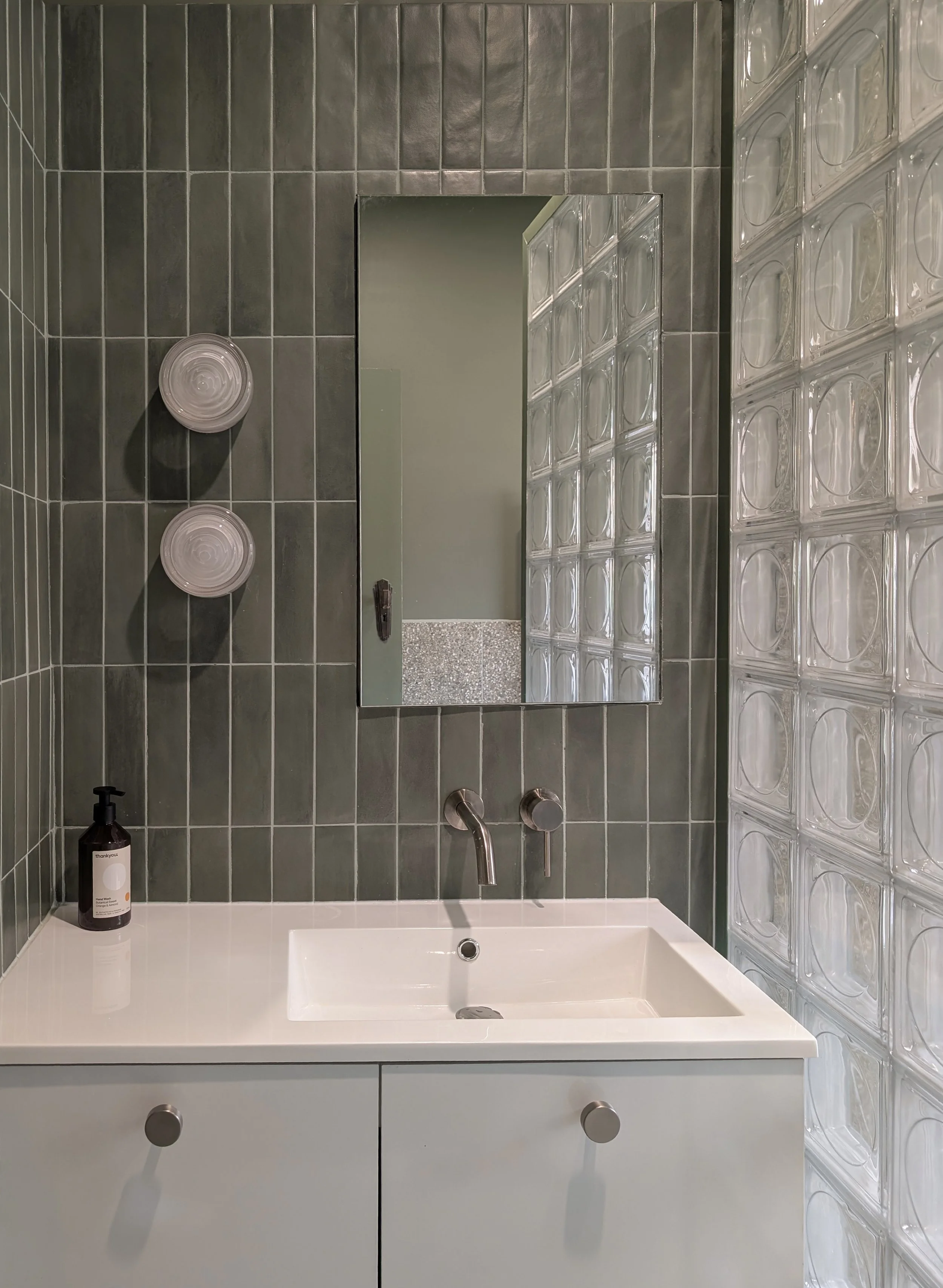 view of modern kitchen vanity in refreshed bathroom design 