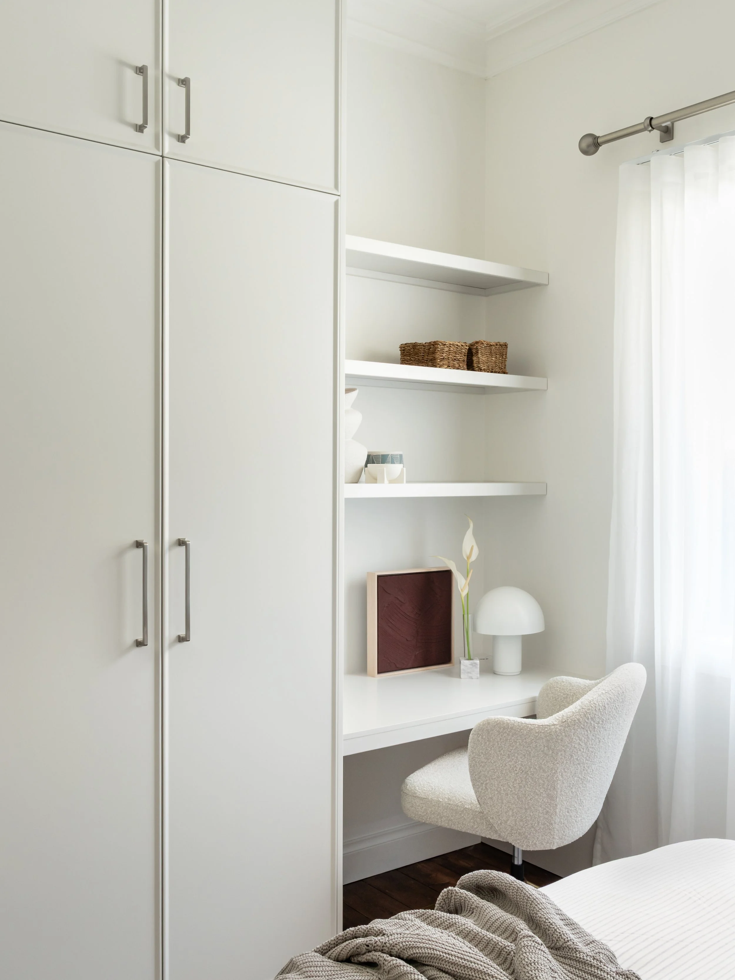 inset desk beside wardrobe, white, clean, minimal interior design