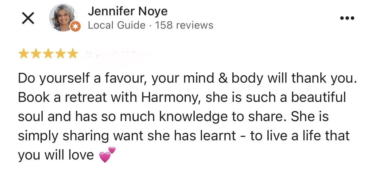 Screenshot of a Google review from Jennifer Noye, a local guide with 158 reviews, praising Harmony for a retreat. The review has five stars and includes pink heart emojis.