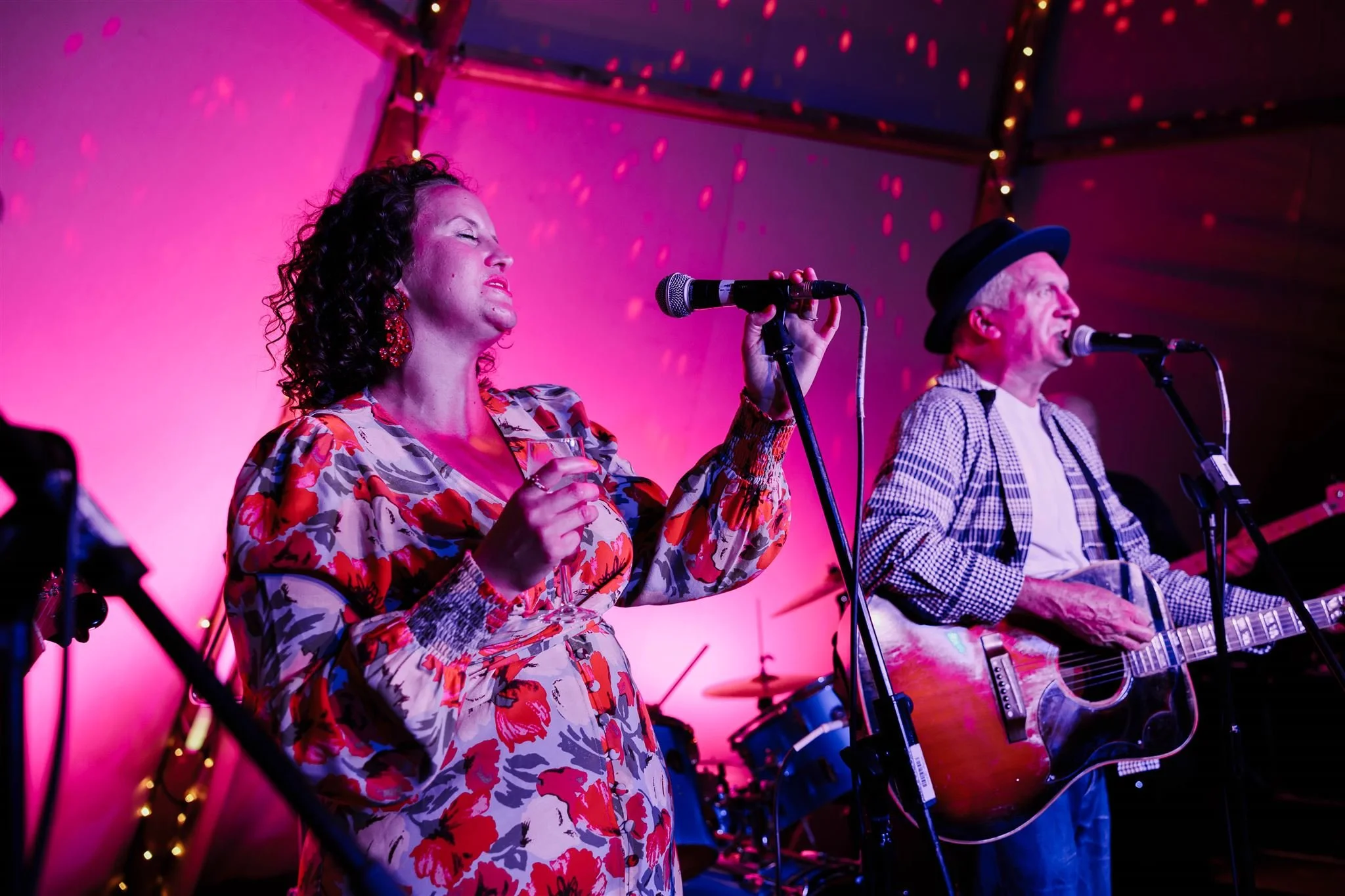 A live band performs in a tipi at a party