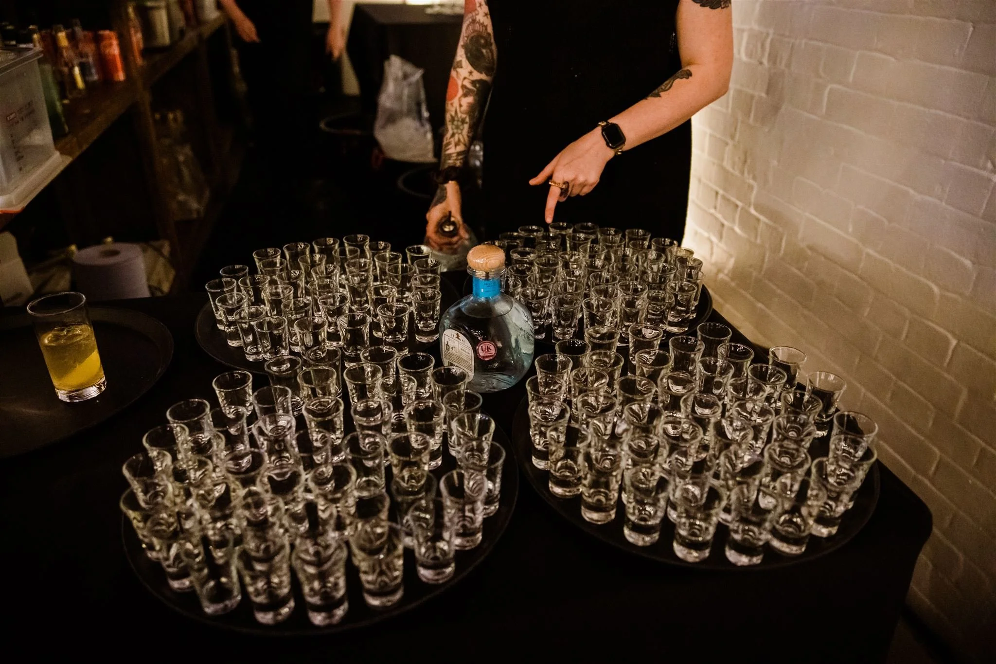 London bar team preparing shots