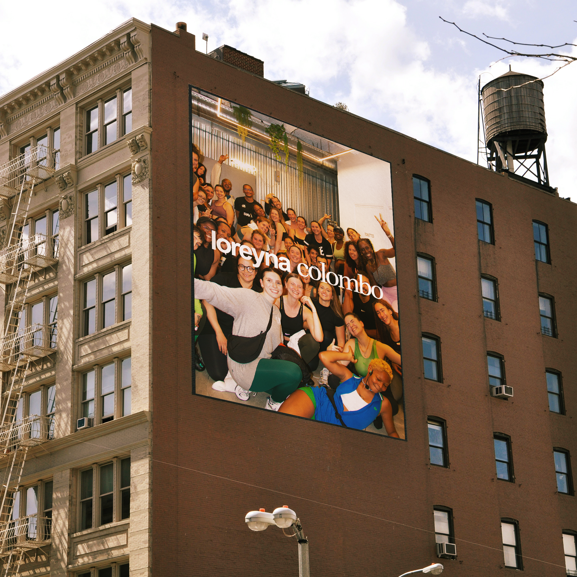 banner on building mockup copy.png