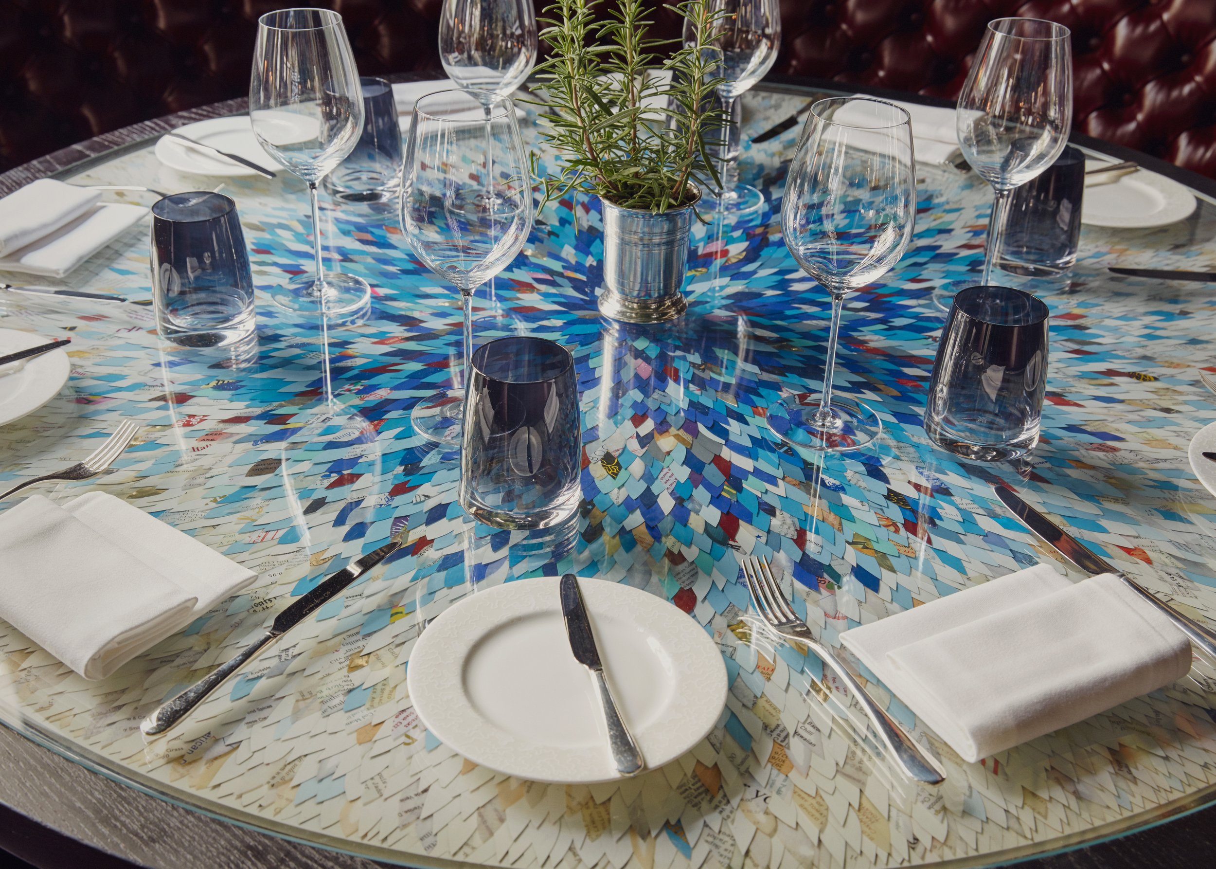 Bespoke table made from cut up recipes sent to Tom Kerridge