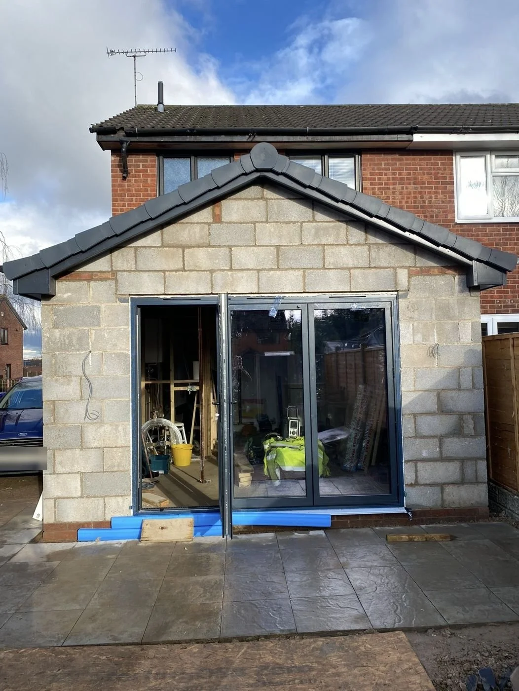 Single-storey vaulted rear extension under construction with bi-fold doors, Ashbourne