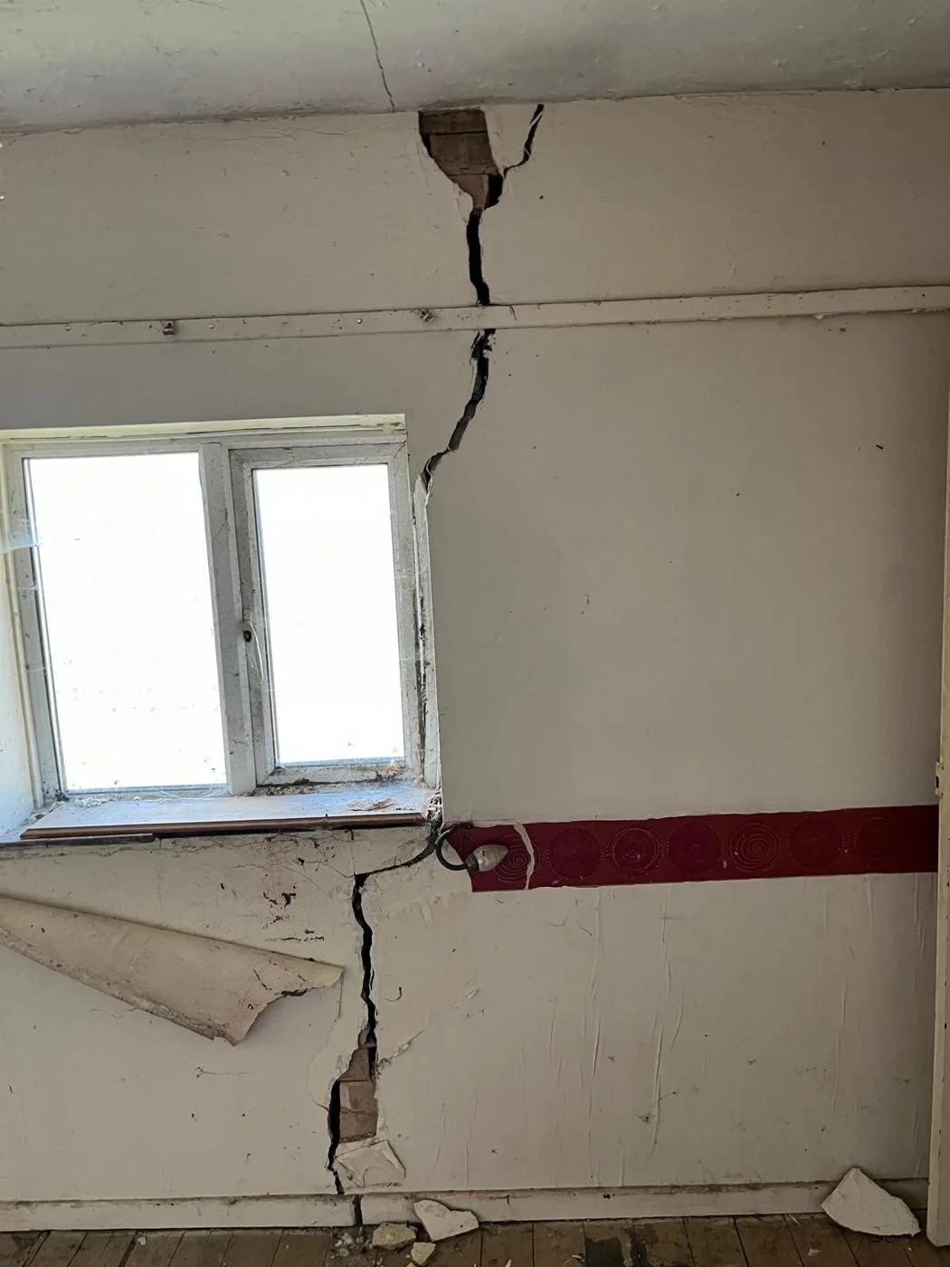 Diagonal subsidence crack from a window corner, Stone, Staffordshire