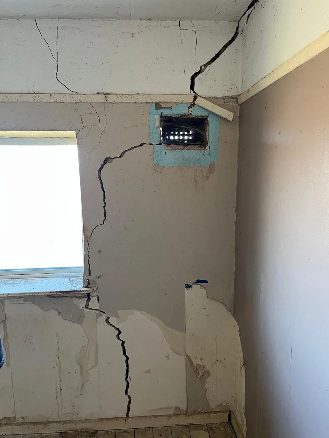 Diagonal subsidence crack running from a bedroom window, Stone, Staffordshire