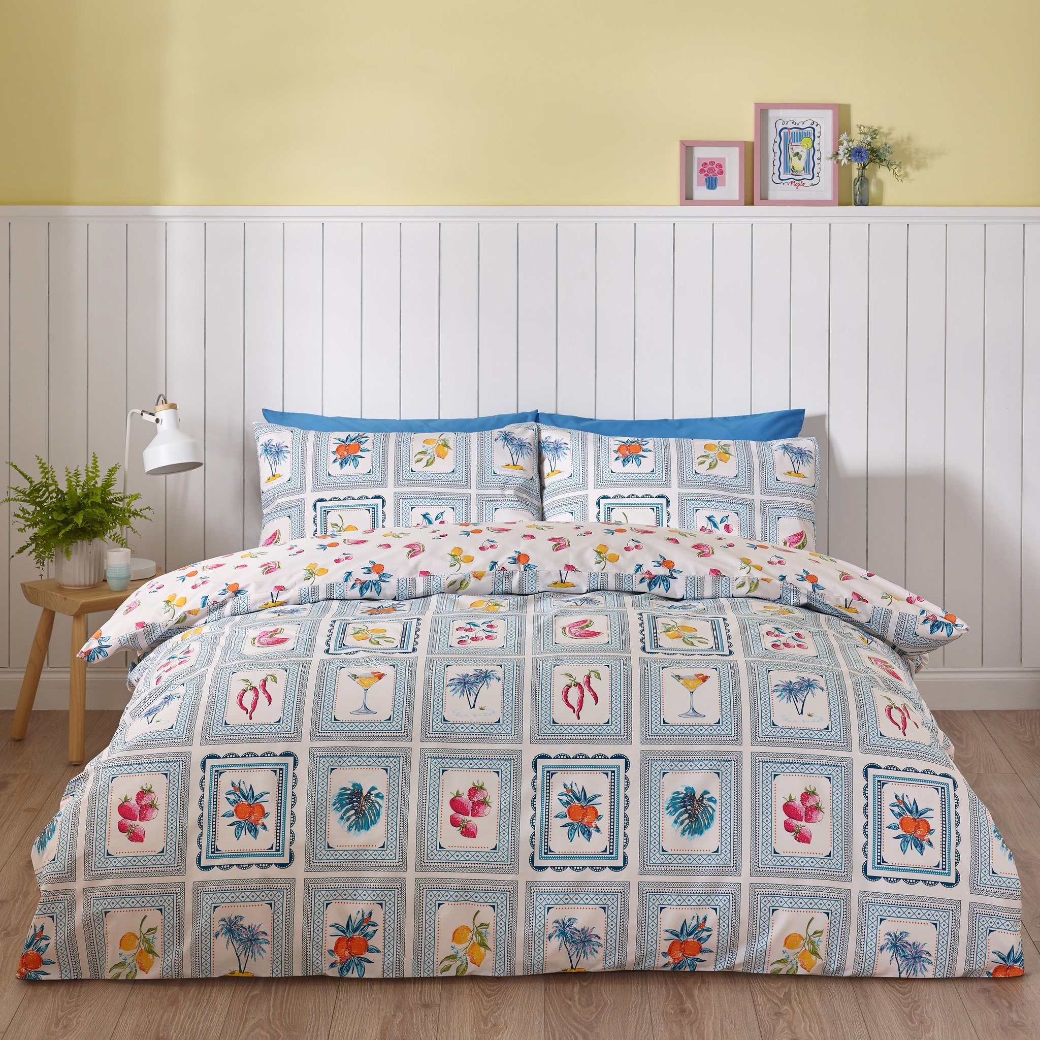 🍓☀️🍑🌴🍋
Riviera Tiles

Bring the vibrant spirit of the Mediterranean into your bedroom with this beautifully designed duvet set. Featuring hand-painted fruits, palm trees, and cocktails in a framed, tile-inspired pattern, it exudes coastal charm. 