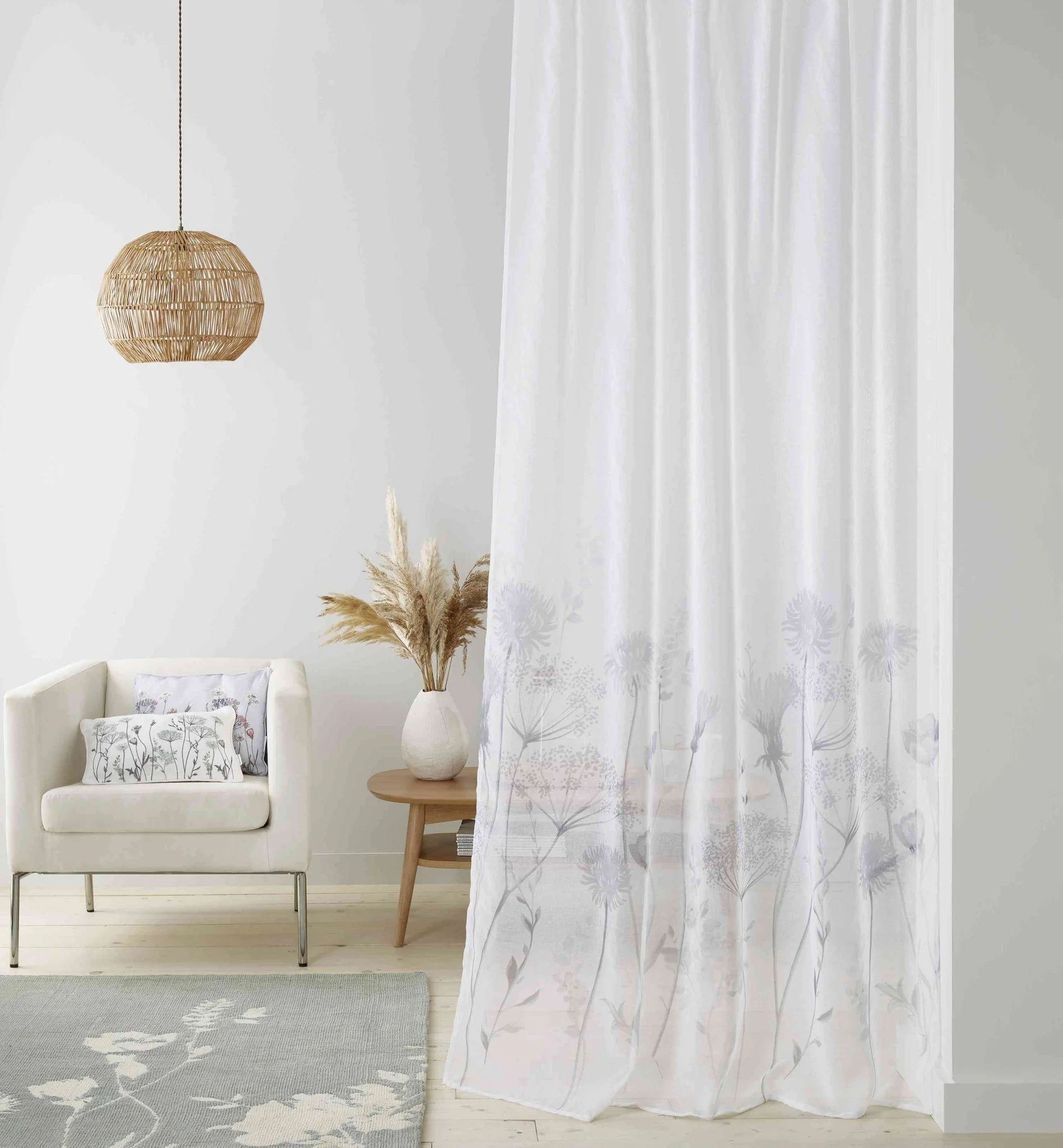 Refresh your space with these countryside-inspired curtains, featuring hand-painted floral silhouettes on a lightweight fabric that softly filters light while offering privacy. 

#CatherineLansfield #CatherineLansfieldHome #WindowStyle #FloralDecor #