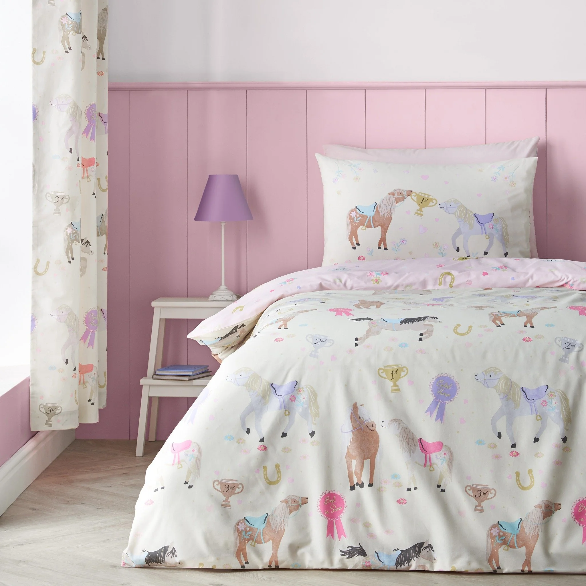Saddle up for sweet dreams with this playful show horse bedlinen, featuring charming ponies, rosettes and lucky horseshoes, with a fun reversible design for an easy style switch. 

#CatherineLansfield #CatherineLansfieldHome #KidsBedding #BedroomFun 