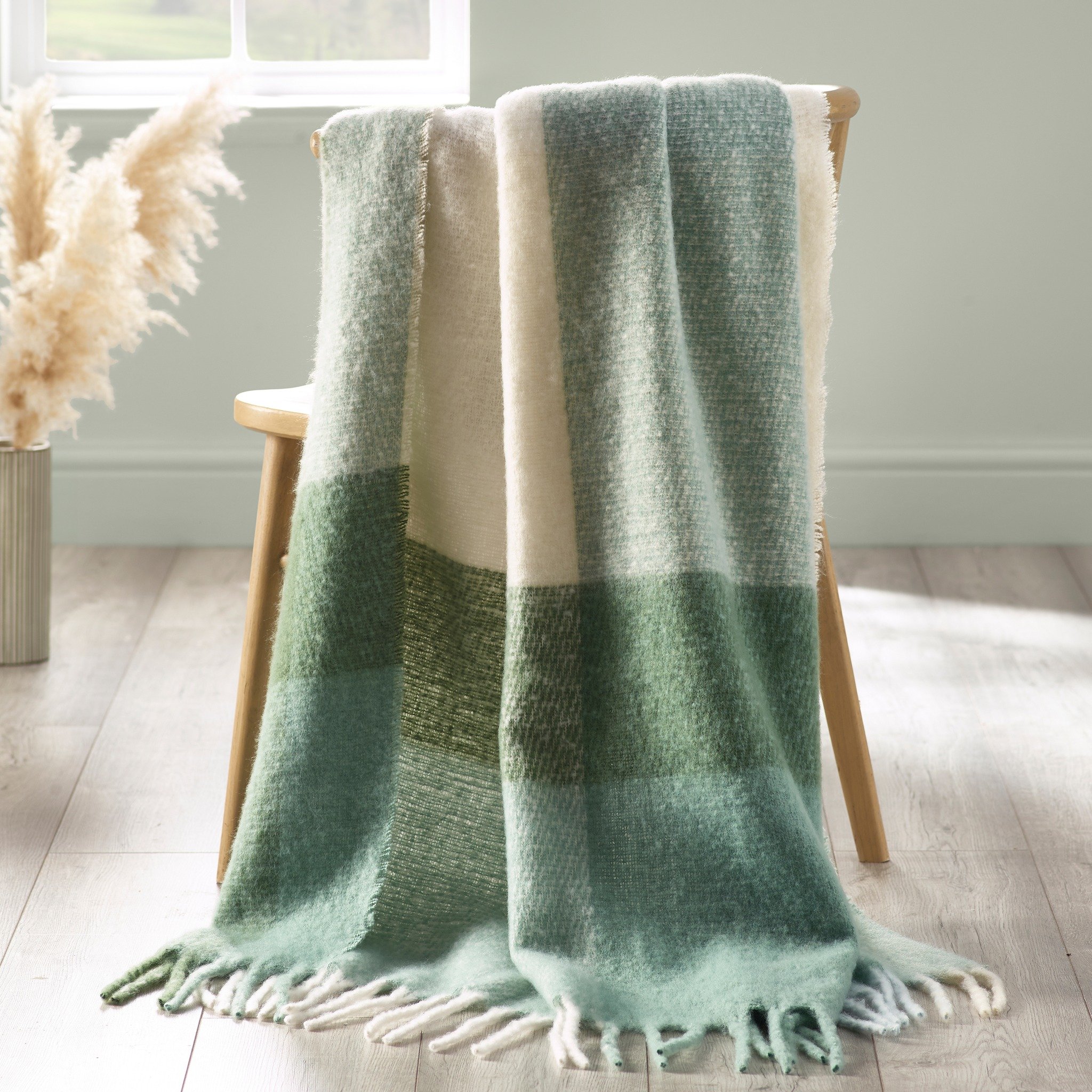 Wrap up in cosy luxury with this super soft faux mohair blanket, finished with a timeless check for an effortlessly sophisticated touch.

#CatherineLansfield #CatherineLansfieldHome #CosyLiving #HomeComforts #CheckDesign #SoftFurnishings #InteriorIns