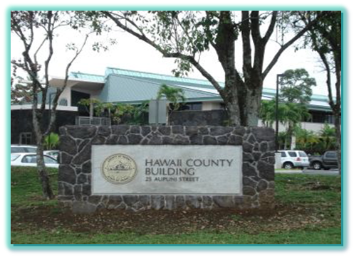 Hawaii County Building sign on stone wall