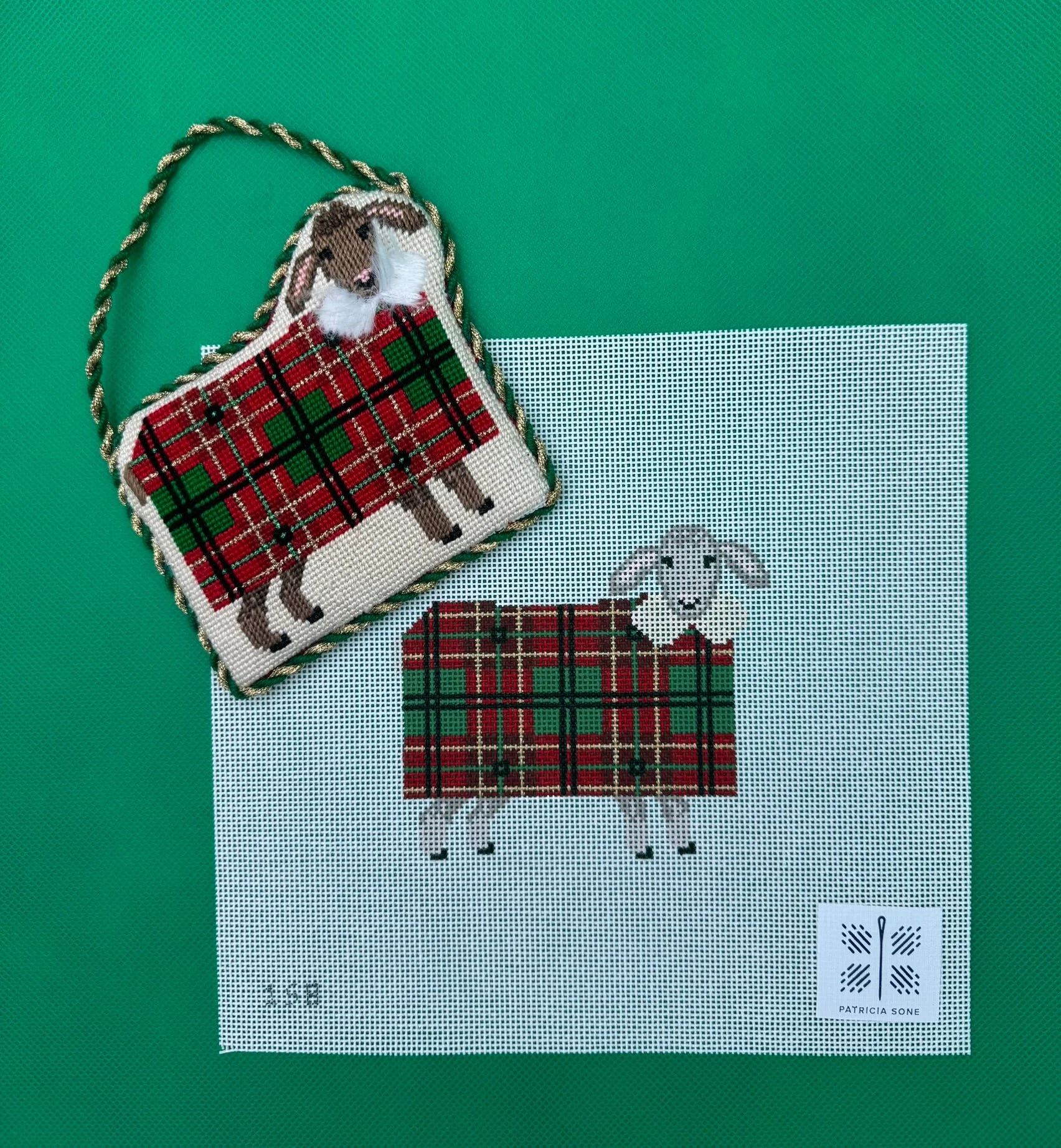 Patricia Sone -sheep with red plaid