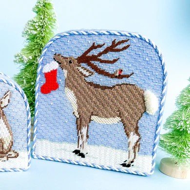 Christmas forest reindeer with stocking.jpg