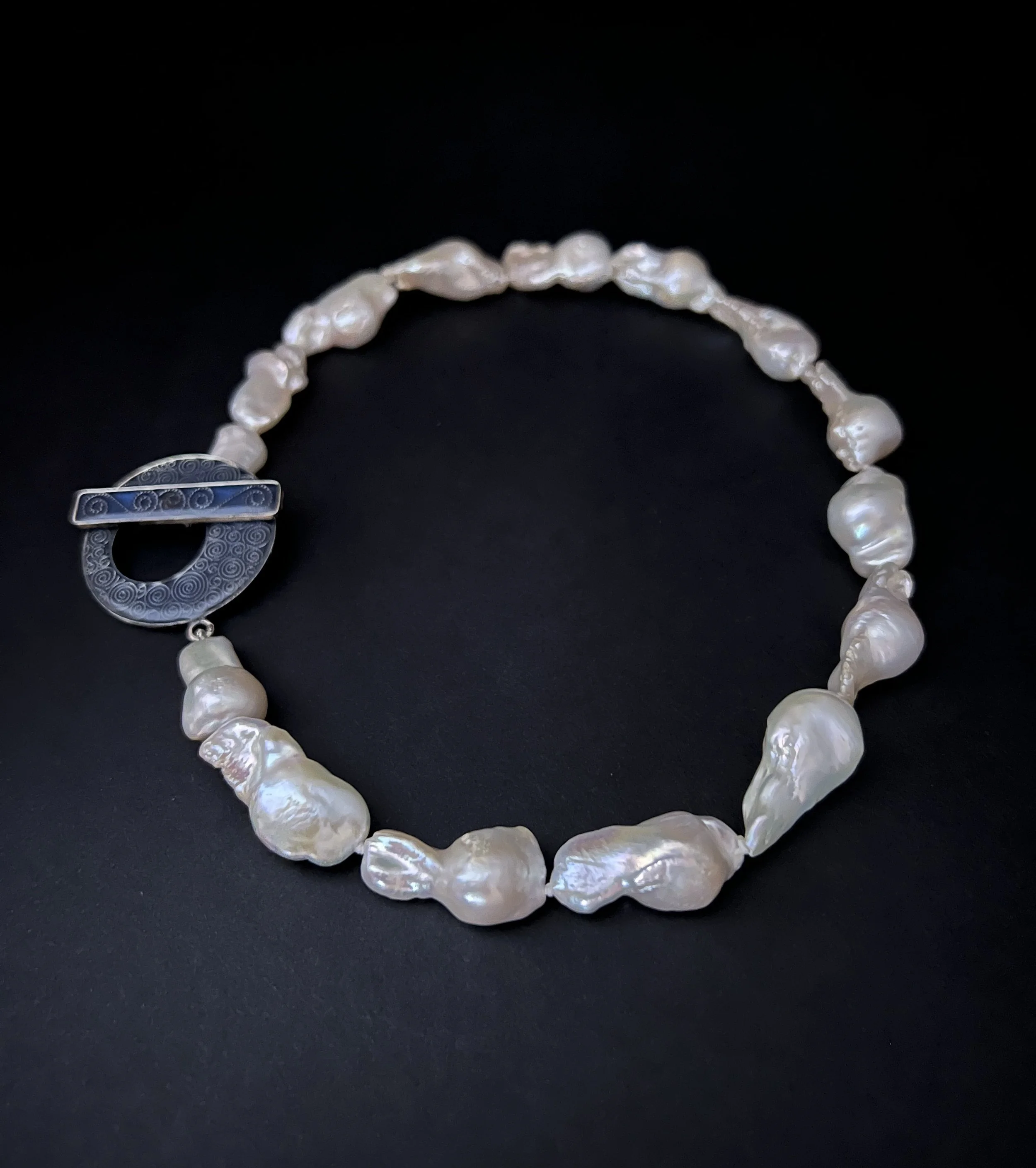 A Bold Clasp for Timeless Pearls