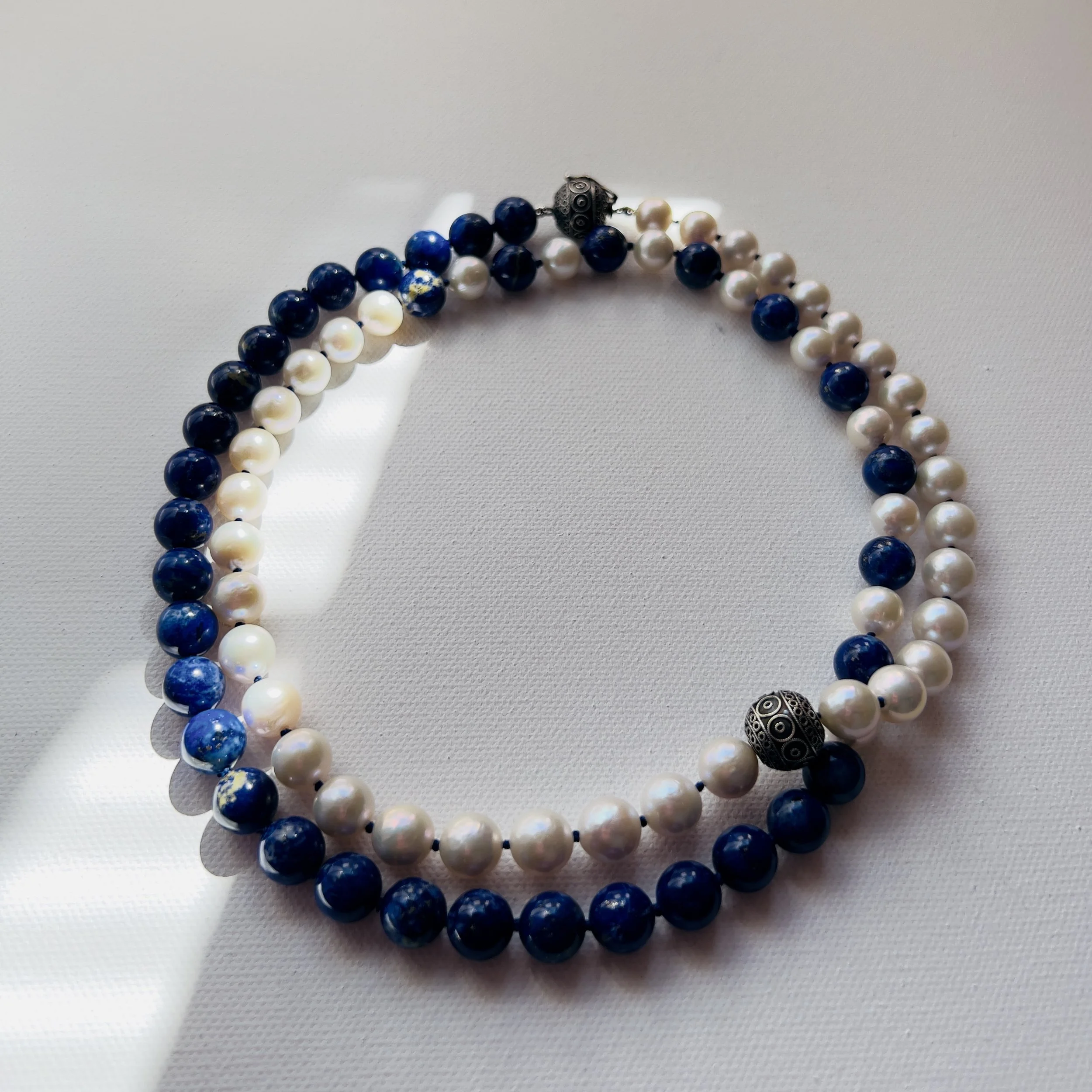 A Dance of Deep Blue and Iridescent White