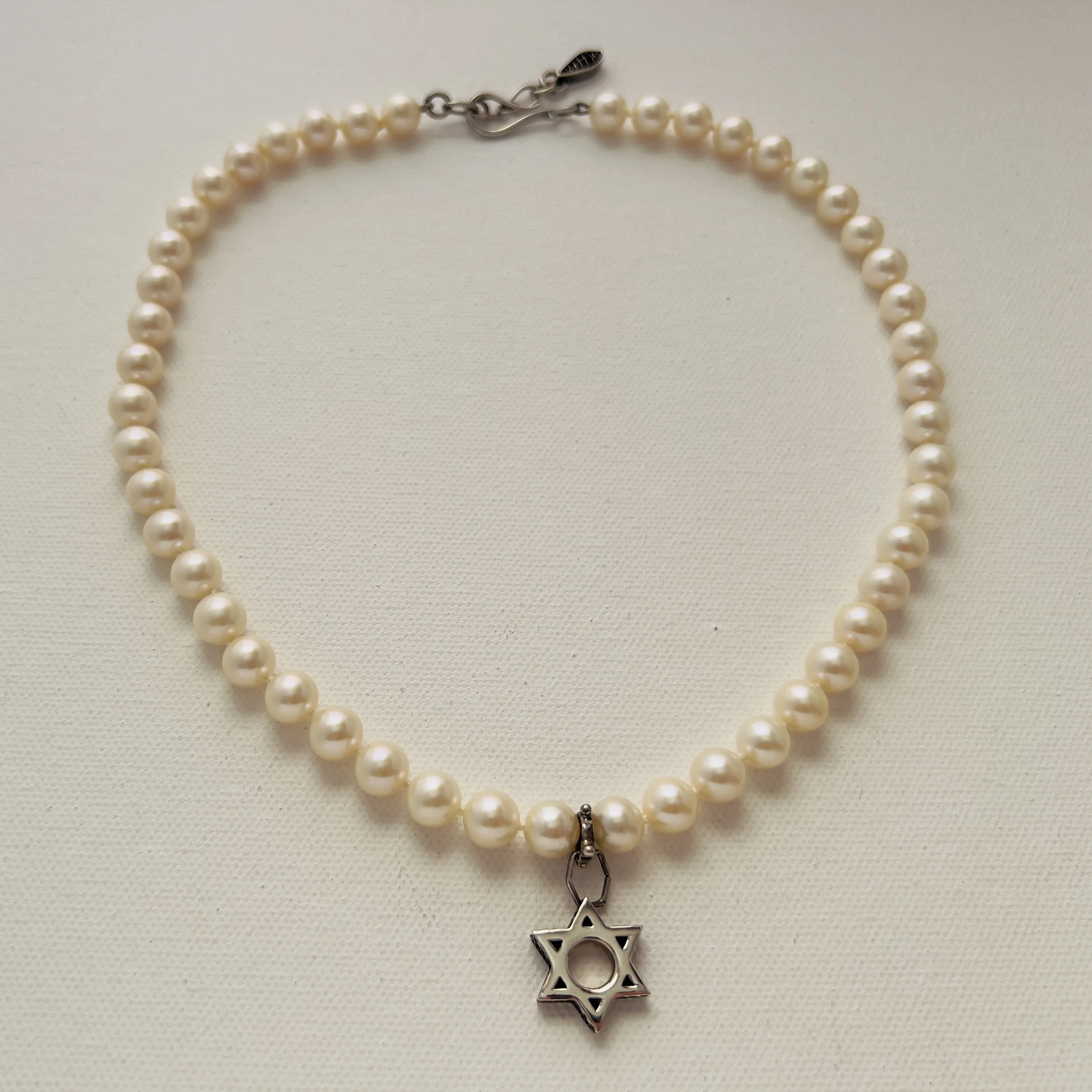 A Star of Faith Amidst a Sea of Pearls