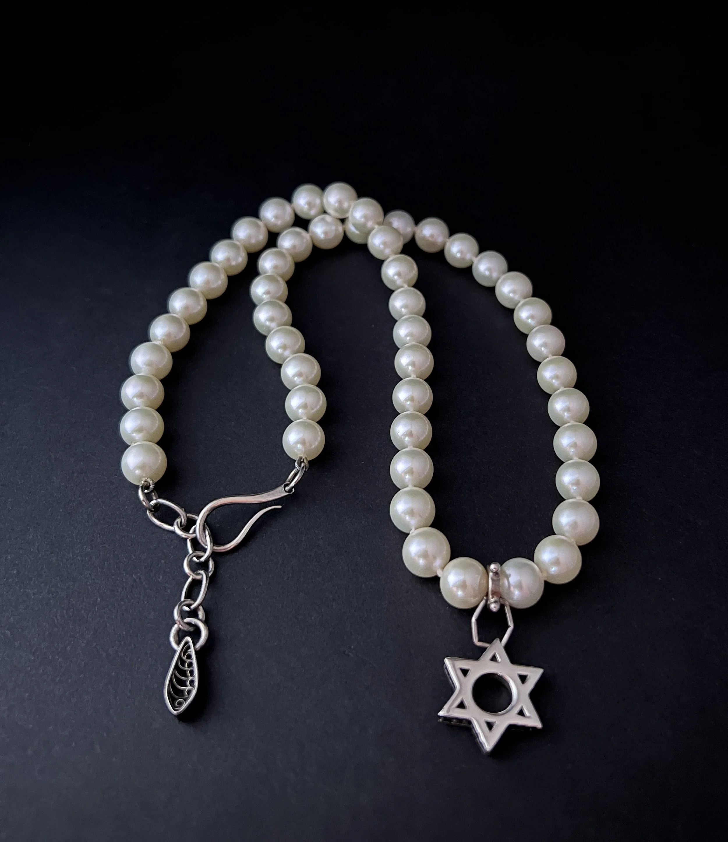 A Star of Faith Amidst a Sea of Pearls