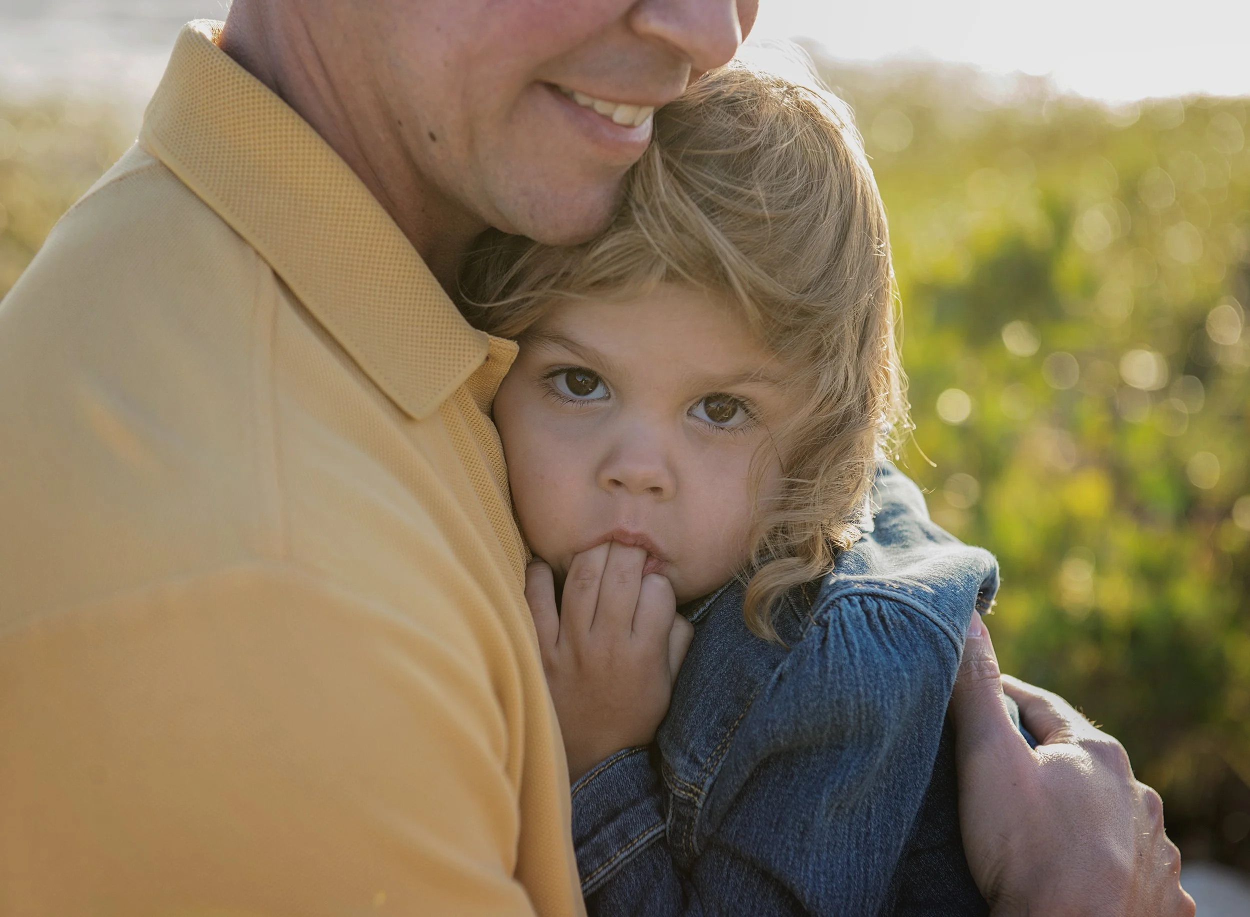 Authentic family photography in Tampa FL capturing real connection between parent and child.