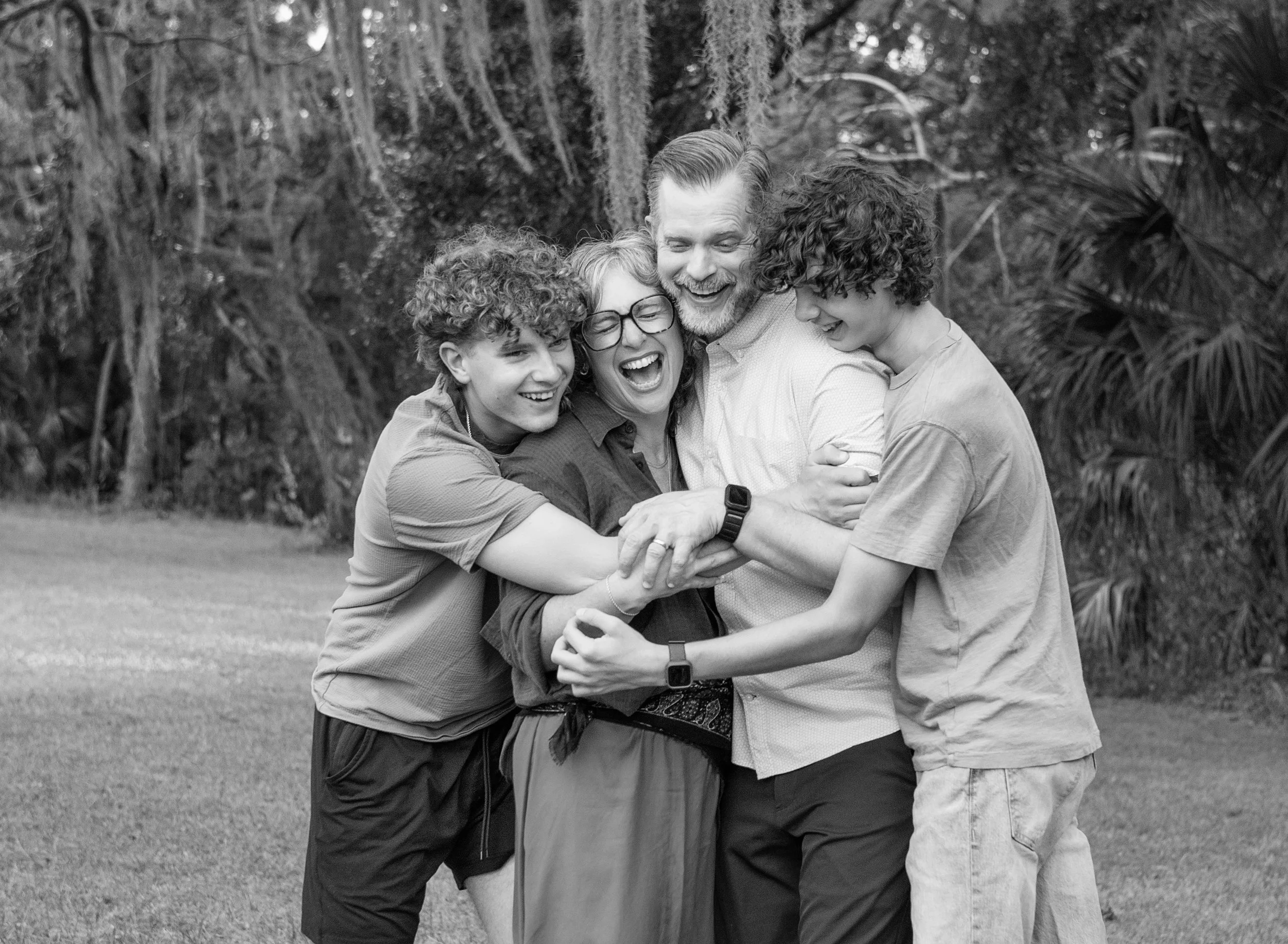 Authentic candid family photo outdoors in Tampa, FL