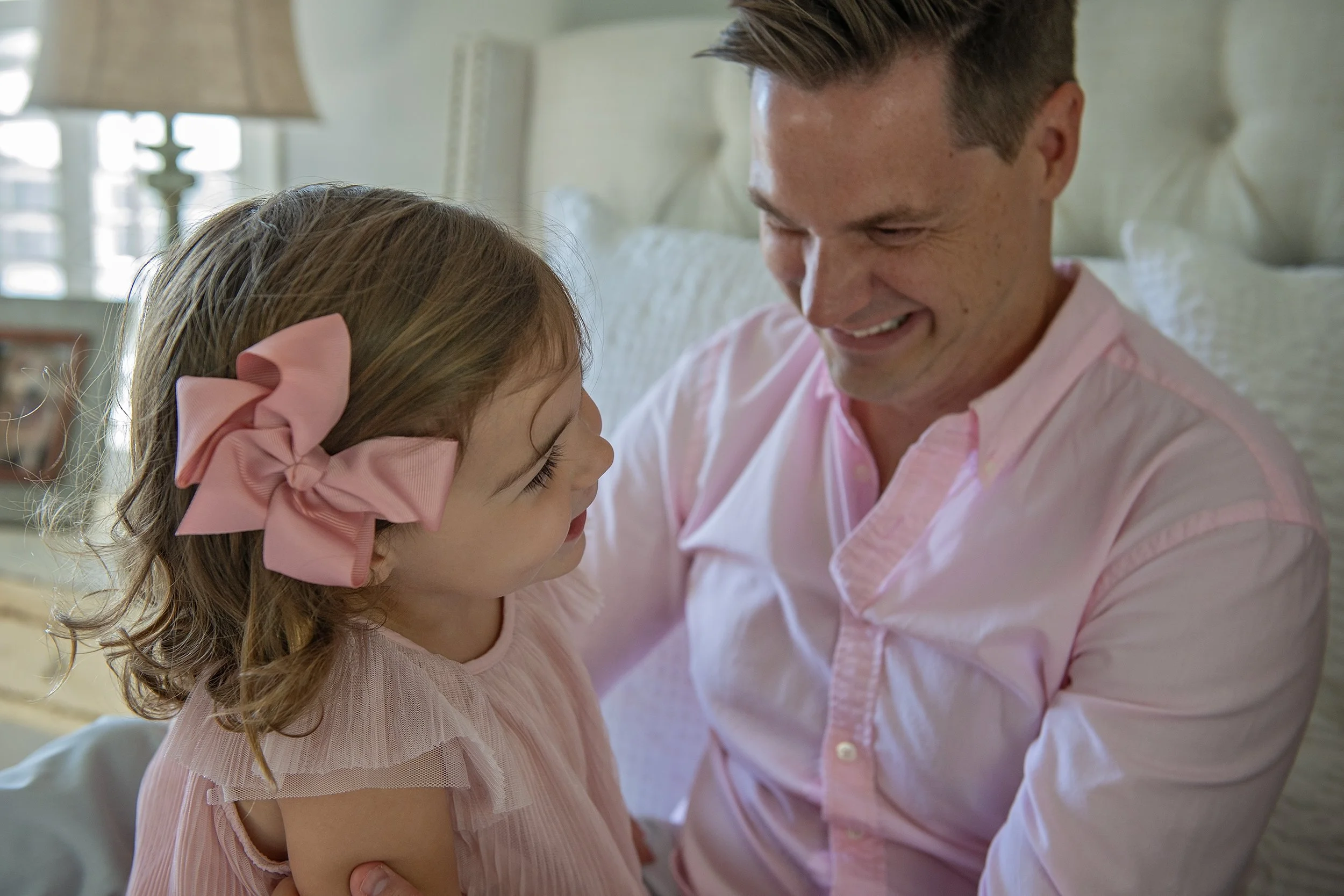 Authentic family connection captured during an in-home family photo session in Tampa Bay