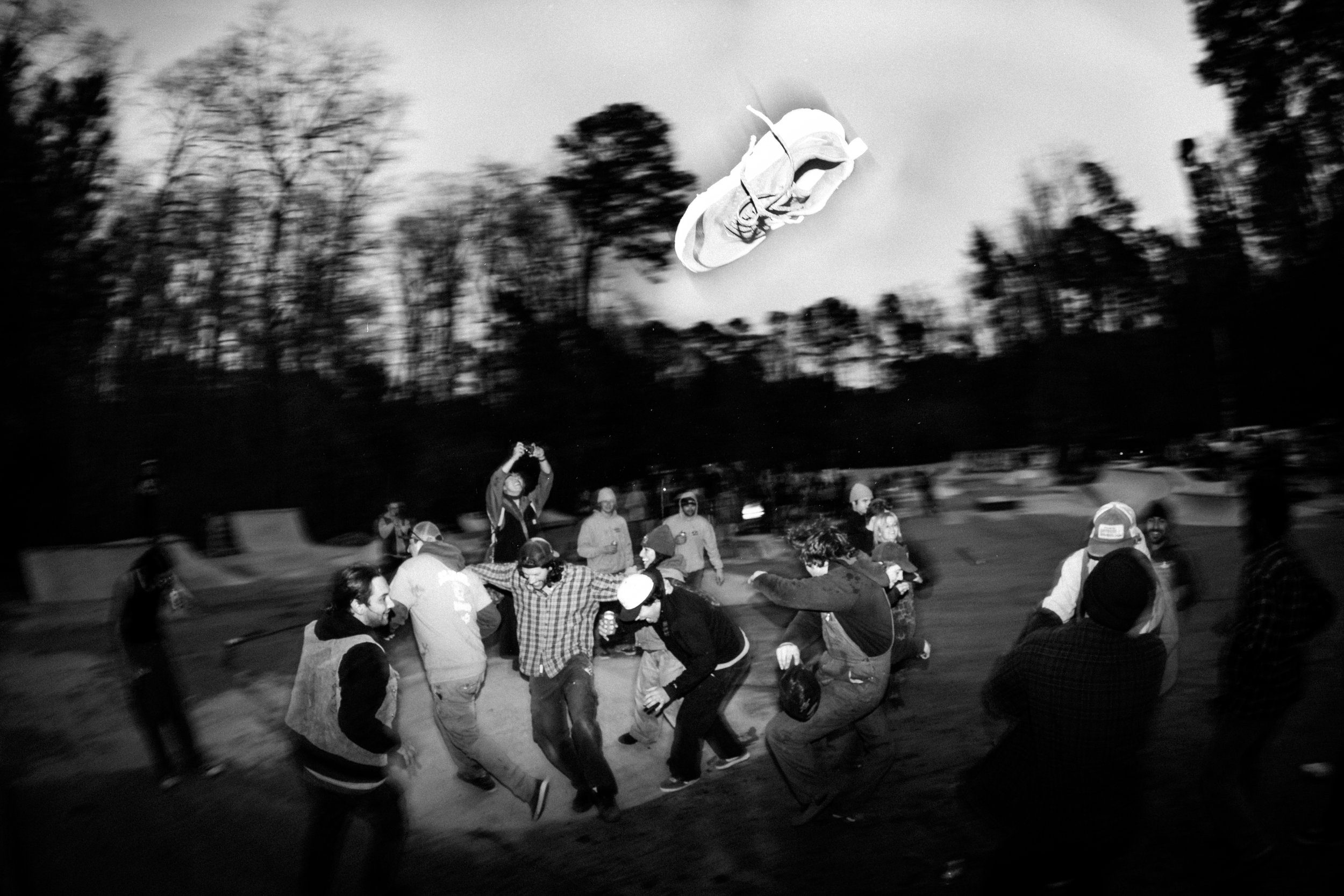 A shoe flies over the mosh pit during the Signals Etc. show at the Graveside end-of-life bash on December 17, 2024.