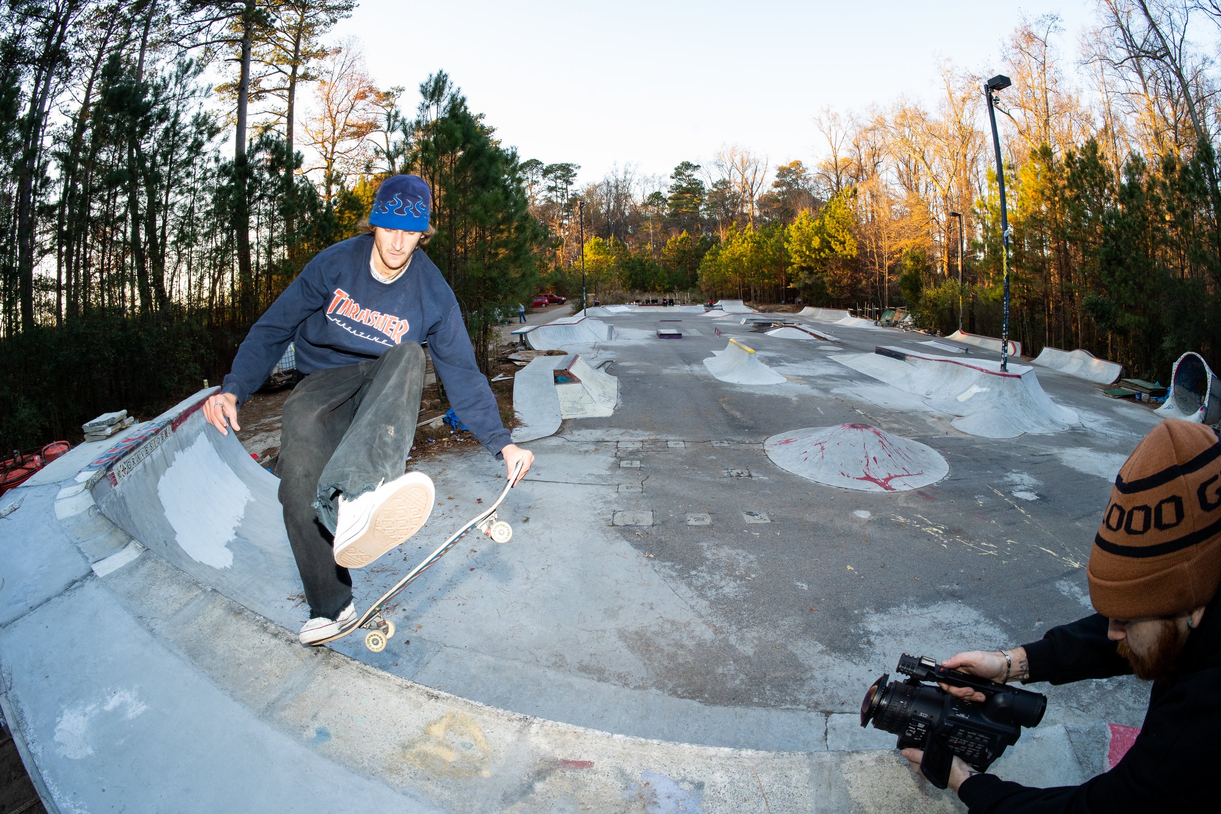 Nick Day performs a judo tail block on the Punk Wall at Graveside DIY in Raleigh, December 1, 2024.