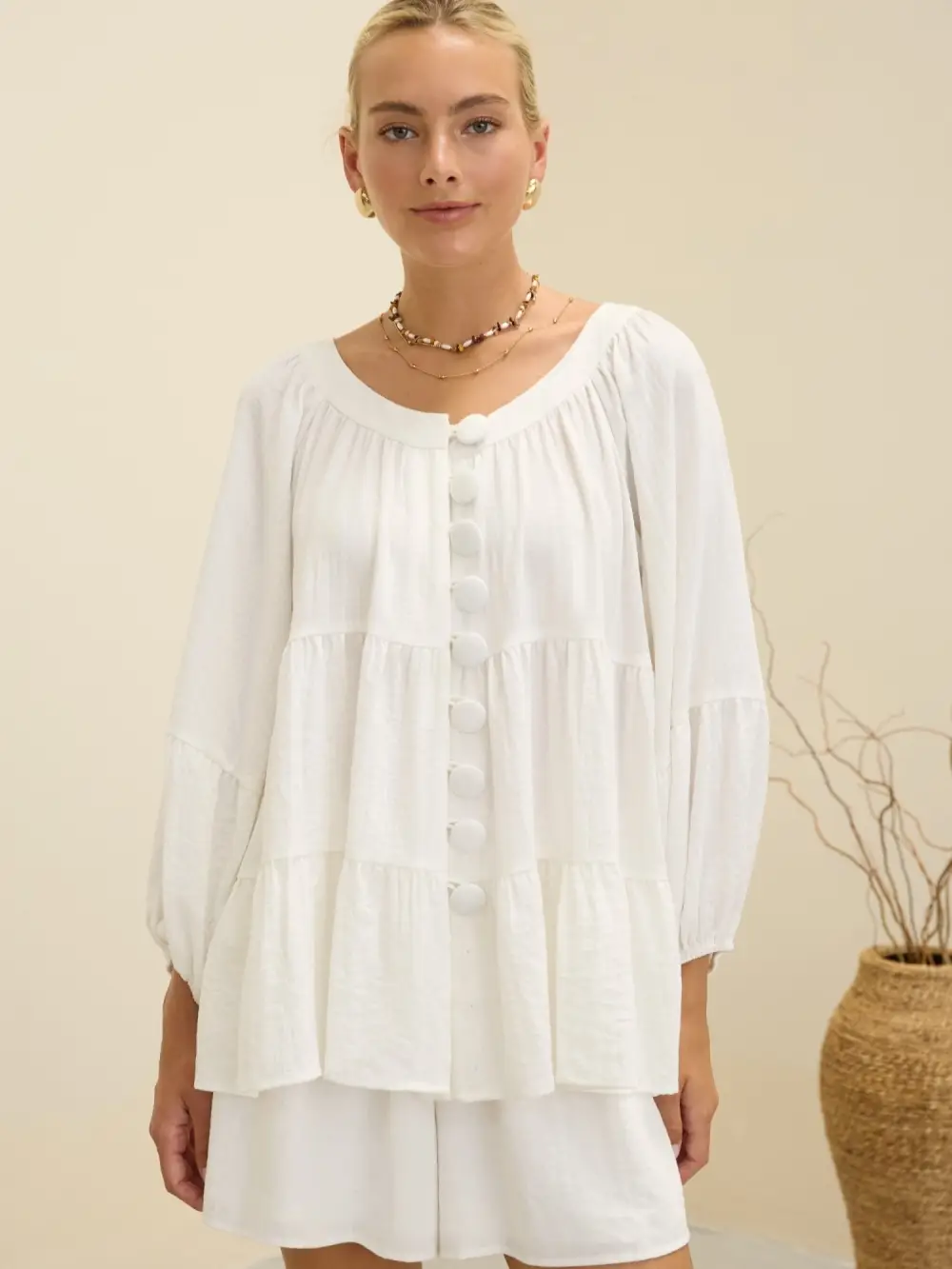 Cream Covered Button Tiered Peplum Top