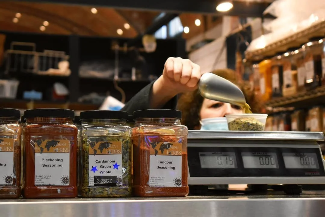 nicole pouring spices.jpg