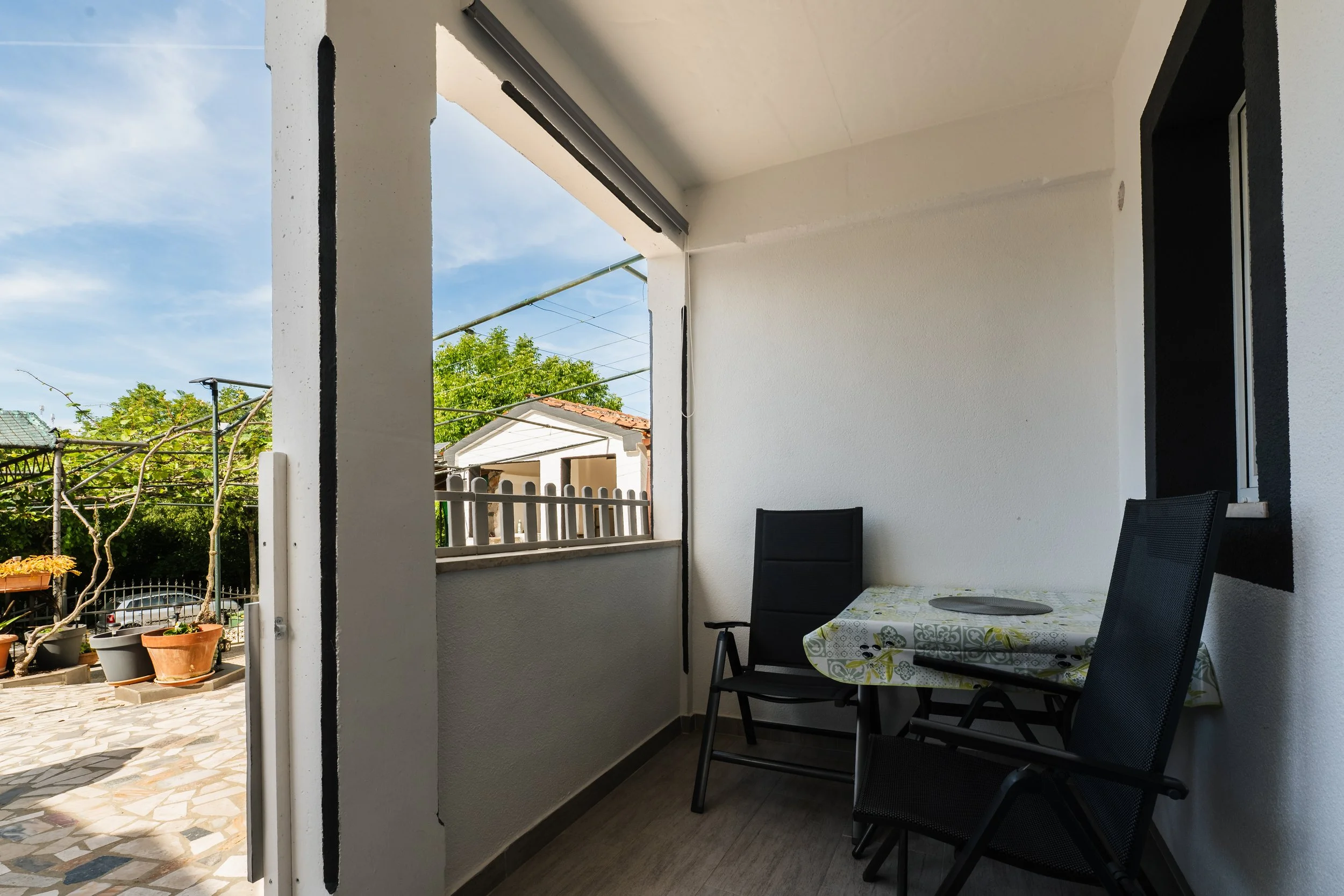 Outdoor view from a small front porch at apartmani Mirko in Rovinj, in the beautiful Croatia under the wonderful summer sun.