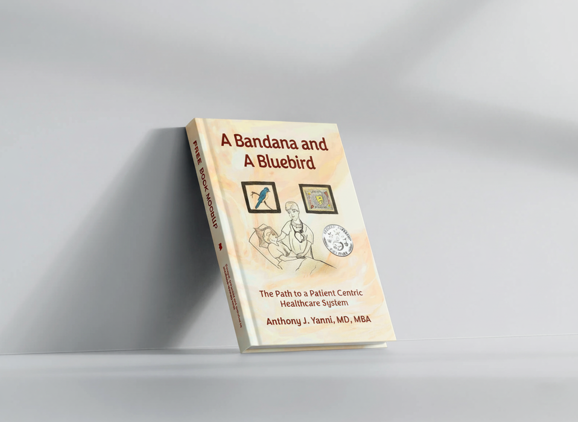 A book titled 'A Bandana and A Bluebird' leaning against a white wall with a white shelf.