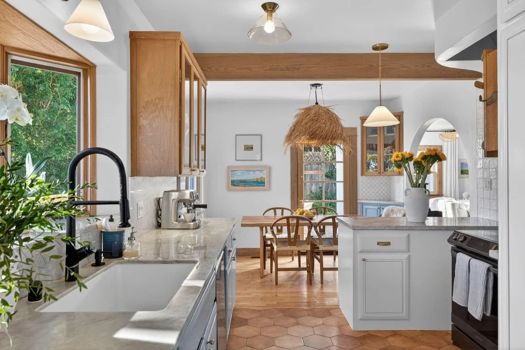 The world is full of magic things, patiently waiting for our senses to grow sharper. - W.B. Yeats

And here she sits, patiently waiting to be enjoyed. Built in 1925, this soulful California Mediterranean cottage is filled with natural light, vintage 