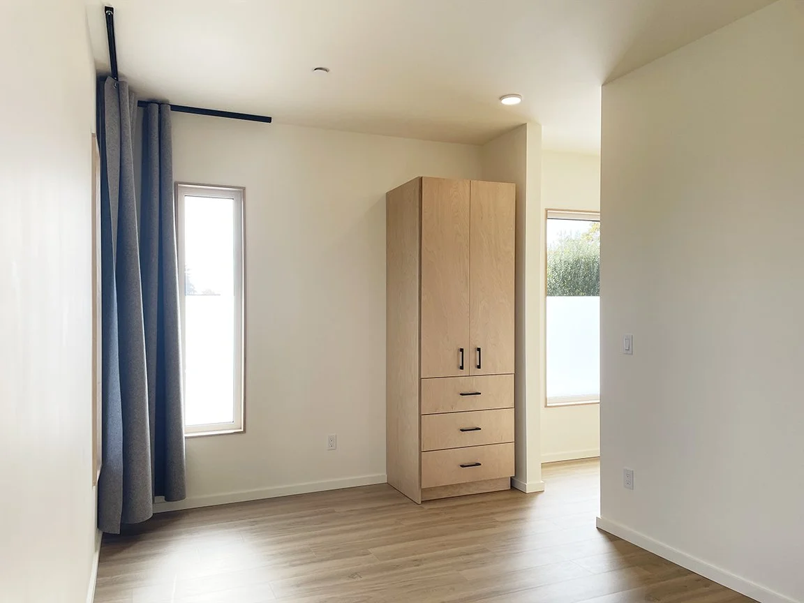 nocturne-apartments-corner-bedroom.jpg