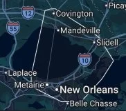 Map showing cities in Louisiana including Covington, Mandeville, Slidell, Lake Pontchartrain, Larose, Metairie, New Orleans, Belle Chasse.