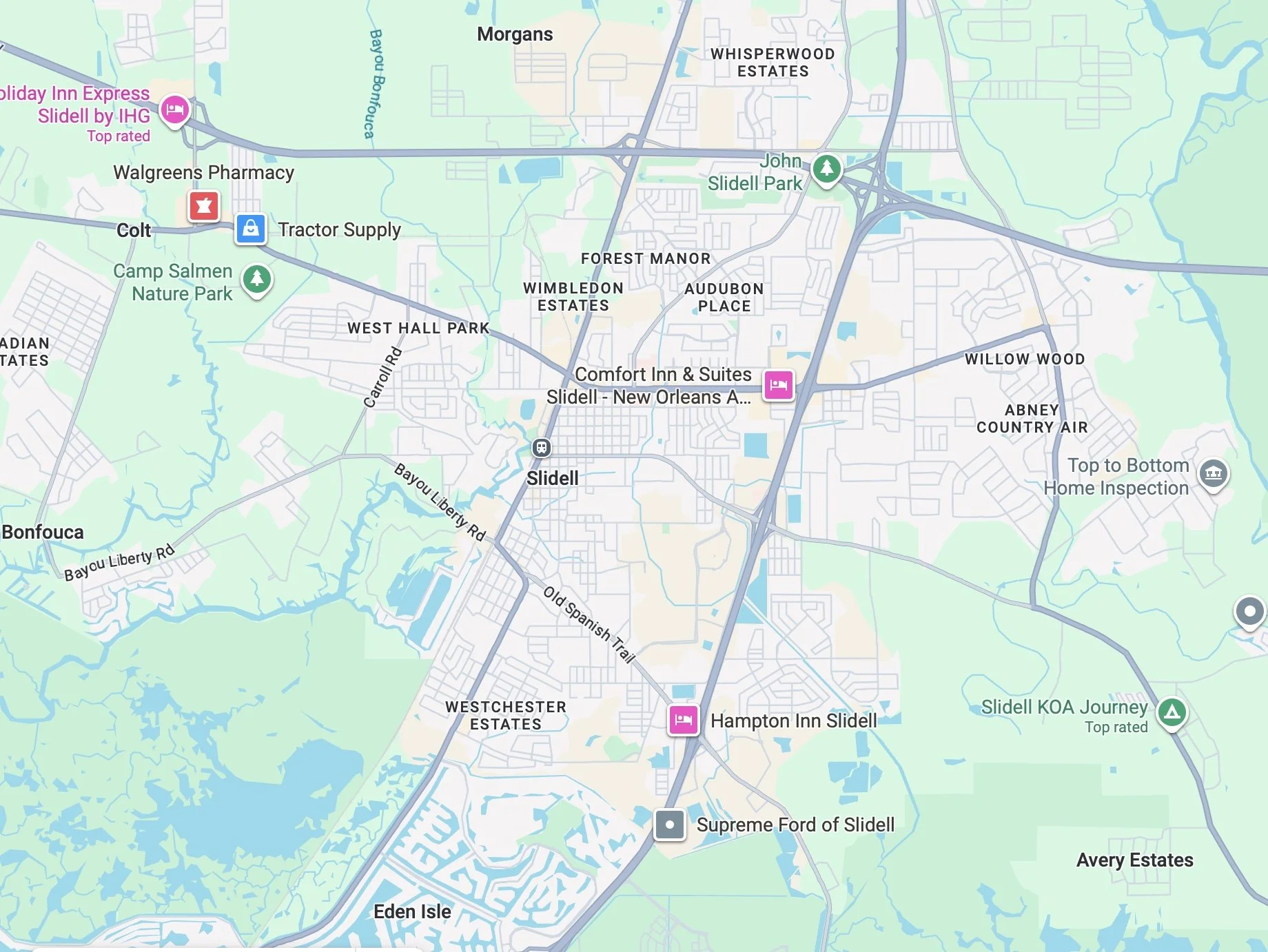 Map of Slidell, Louisiana, showing neighborhoods, parks such as John Slidell Park and Camp Salmen Nature Park, and landmarks including Holiday Inn Express Slidell by IHG, Comfort Inn & Suites, and Supreme Ford of Slidell.