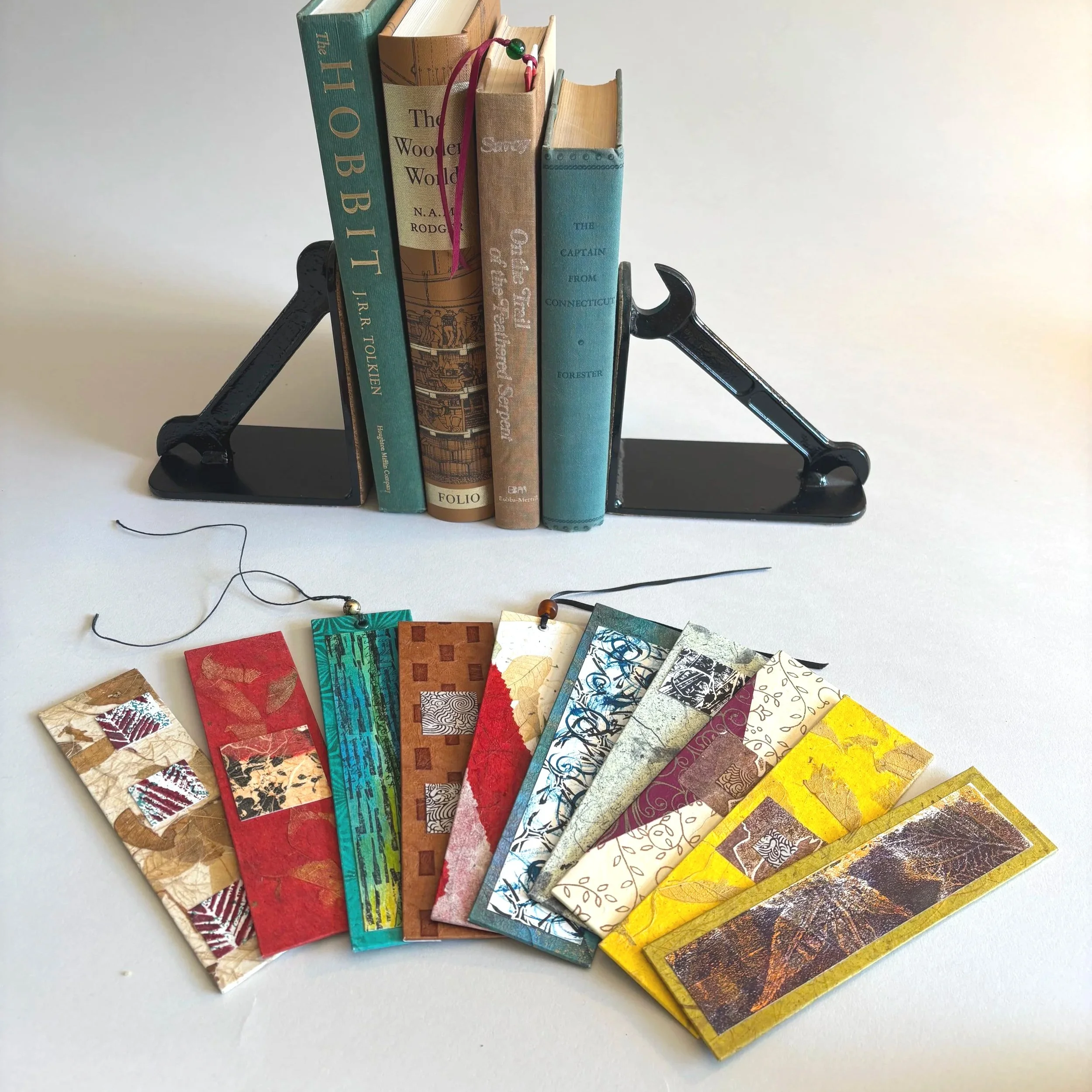 Collaged bookmarks and upcycled bookends