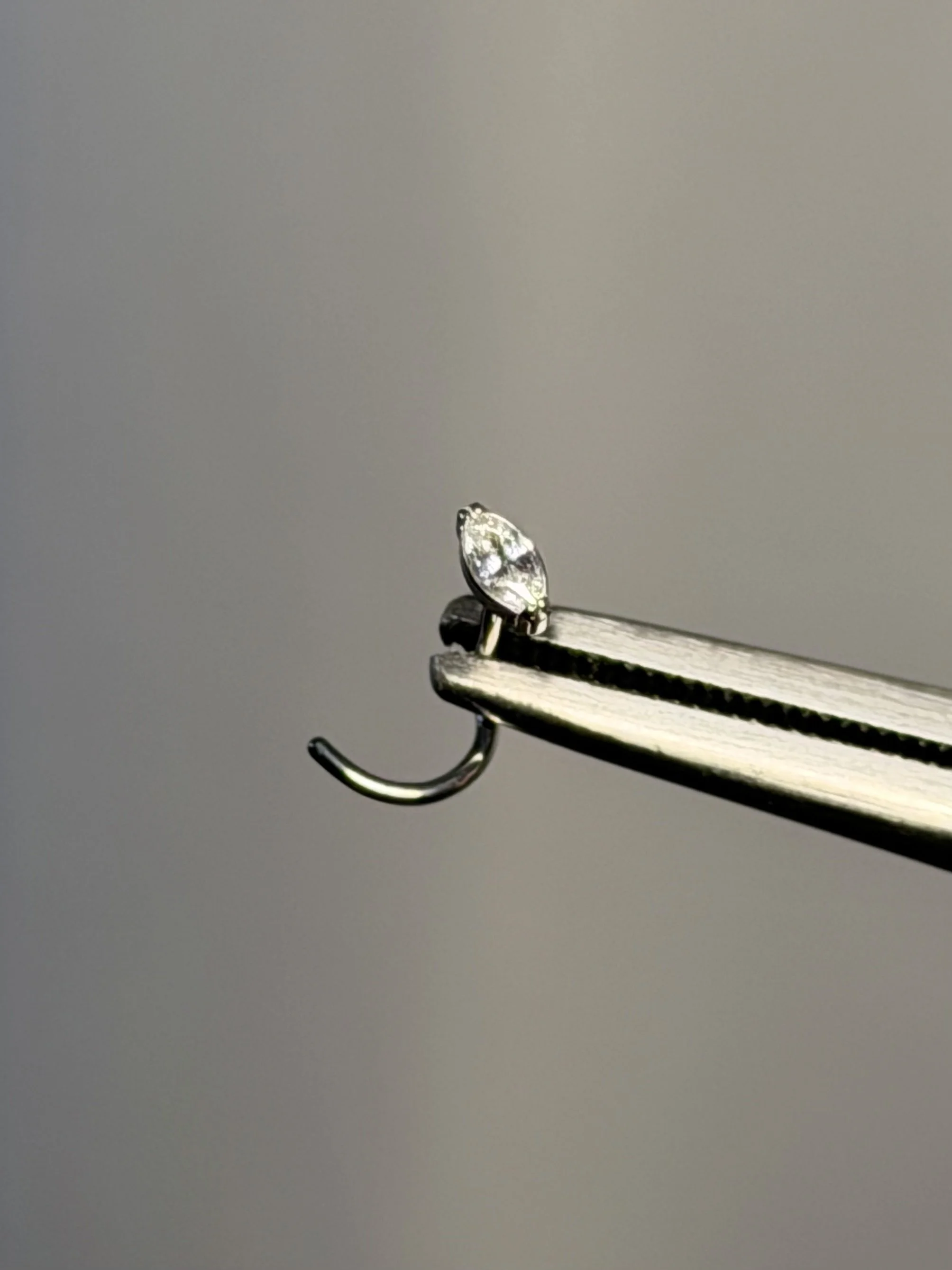 Implant grade titanium marquise corkscrew nose stud silver