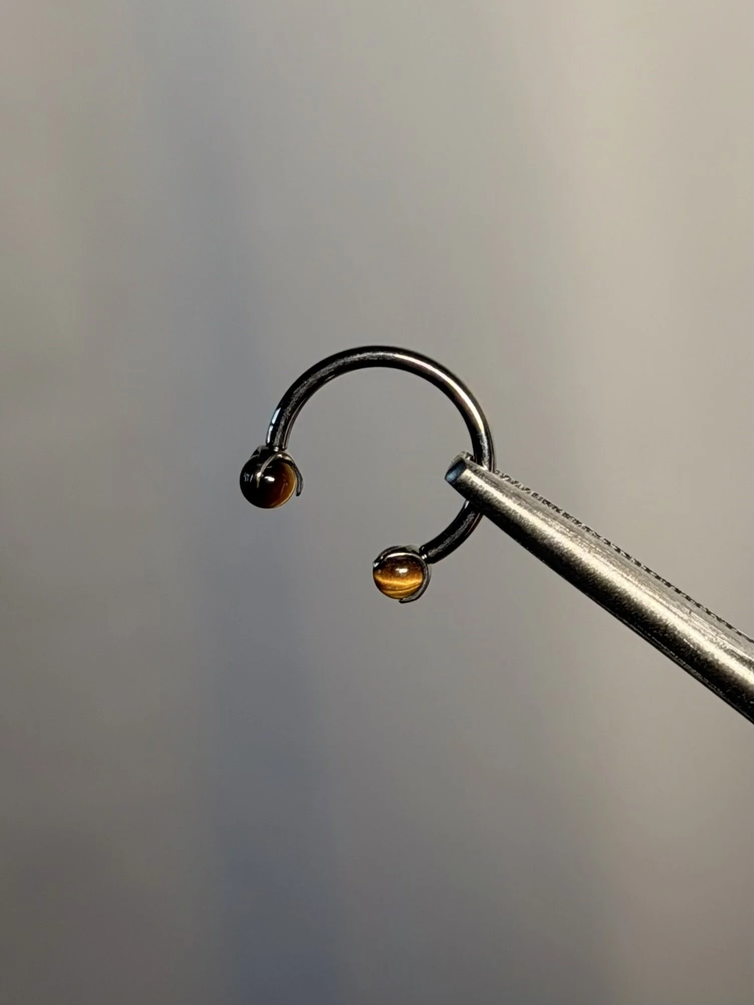 Implant grade titanium internally threaded horseshoe barbell precious stone tigers eye